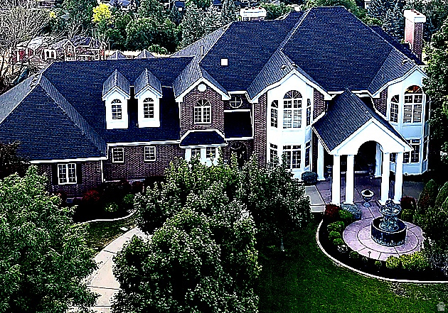Generating strong early interest with continued activity. Homes offering this level of size, layout flexibility, and setting are rarely available in Logan.  7-bedroom luxury estate with over 9,500 sq ft on a private cul-de-sac lot with unobstructed valley and mountain views. Original-owner, custom-built home designed for scale, flexibility, and true multi-generational living-something rarely available in this market.  Tucked at the end of a quiet cul-de-sac, this home was built with intention from the beginning-designed for space, privacy, and the ability to live without compromise. Expansive living areas filled with natural light create a setting that works just as well for large gatherings as it does for everyday living.  The fully finished lower level, complete with a second kitchen, creates a true secondary living environment-ideal for extended stays, multi-generational living, or private guest space.  Upstairs offers a substantial bedroom layout with flexible spaces that adapt as needs change over time.  Outside, multiple decks and patios capture the surrounding views, while the circular driveway, 4-car garage, and mature landscaping create a strong sense of arrival and privacy.  Properties with this level of space, layout, and setting rarely become available-reach out for showing availability.  Buyer to verify all information, including square footage and bedroom count.