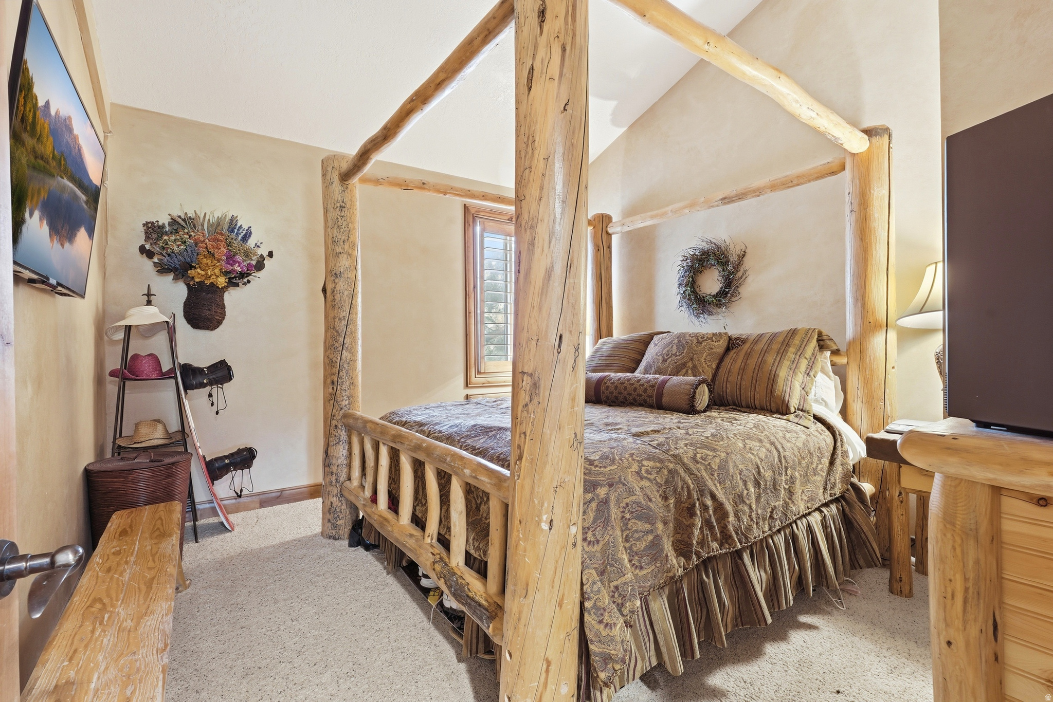 Rare opportunity to own a unique multi-level Bear Lake getaway with panoramic lake and mountain views, dual kitchens, and immediate enjoyment with no nightly rental reservations to honor - ready for use the day it records. This fully furnished condo spans both the 2nd and 3rd levels, offering approximately 1,400 sq ft with walkout patios on both levels. Owners also have the main level that is for sale so you could purchase both and have all levels if desired.  The main living level features 2 bedrooms, 2 full baths, spacious living area, knotty alder cabinetry, and a full kitchen with new tile flooring and custom tile finishes that continue through the bathrooms and tub/shower surrounds. The upper level adds an additional bedroom, full bath, kitchen, living area, and private patio, creating excellent flexibility for guests, multi-family use, or separate living space. Staircase access from the main living area patio leads directly to the shared lawn, beach, and resort amenities. Additional features include AC units throughout, Dish satellite service, televisions in both bedrooms, and a large living room TV perfectly positioned to relax while taking in views of Bear Lake. Ideal for personal enjoyment or a turnkey Bear Lake retreat. ****Square footage figures are provided as a courtesy estimate only and were obtained from county records. Buyer is advised to obtain an independent measurement.