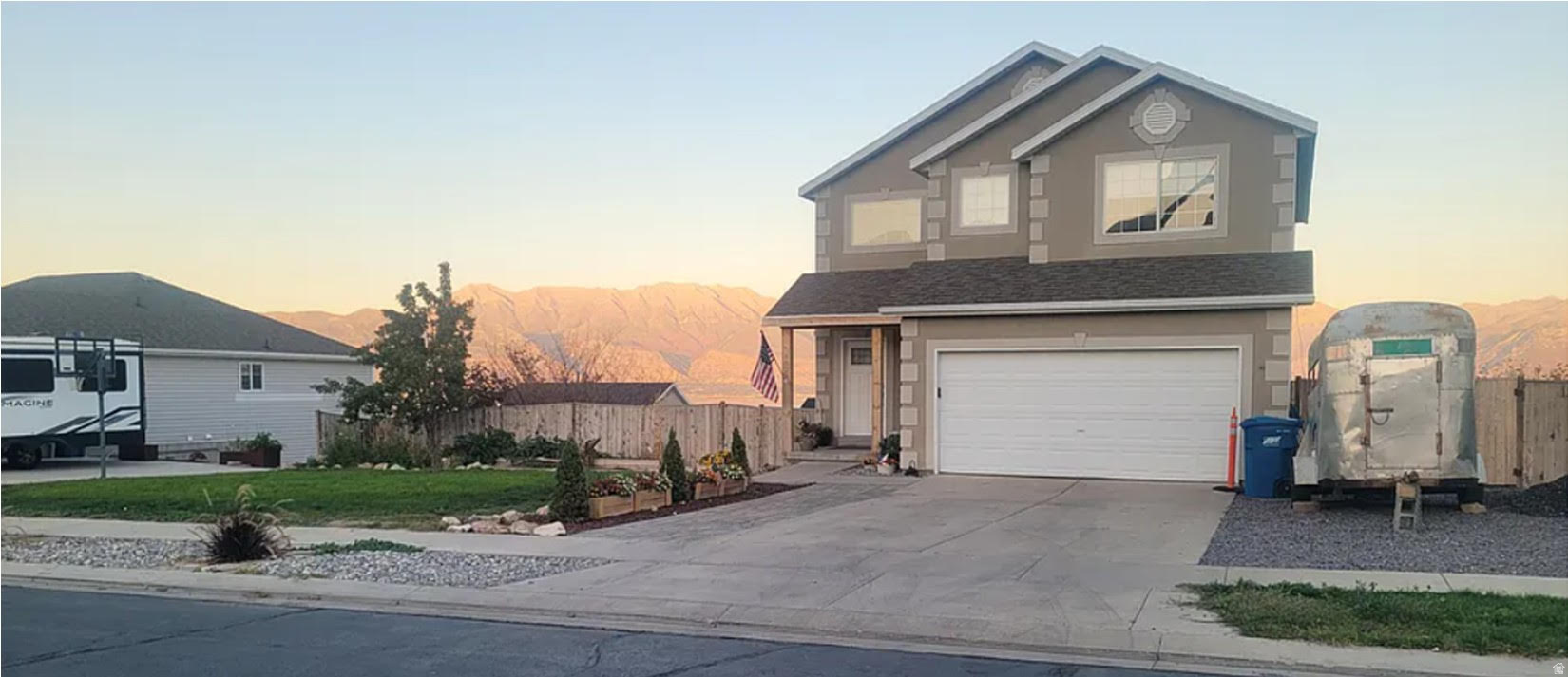 : VIEW VIEW VIEW!!! Perched on a spacious lot with breathtaking 180+ degree panoramic views of Utah Lake and the Wasatch Mountains, this exceptional 3-bedroom, 2.5-bath home offers the perfect blend of comfort, recreation, and outdoor living. Enjoy stunning lake and mountain views from the primary suite, main living area, and expansive back deck-creating an incredible backdrop for everyday living and entertaining. This thoughtfully designed two-story home with a finished basement features three separate family living spaces, providing flexibility for gathering, recreation, work, or quiet retreat. The open and inviting layout offers room for everyone with living areas on the main floor, upper loft, and basement. Outdoor enthusiasts will love the unbeatable location. With mountain trail access across the street, this property is a dream for ATV, UTV, and four-wheeling enthusiasts, offering quick access to miles of trails and outdoor adventures. After a day on the mountain, relax around the fire pit or soak in the sweeping views of Utah Lake and the Wasatch Mountains from the expansive deck. The large yard offers plenty of space for recreation, gardening, and pets, complete with a dog run and insulated dog house. Gravel RV parking and room for the toys! Whether you're seeking spectacular views, room to spread out, or immediate access to Utah's outdoor recreation, this home offers a rare opportunity to enjoy it all. Come experience the views, the space, and a lifestyle that is hard to match.