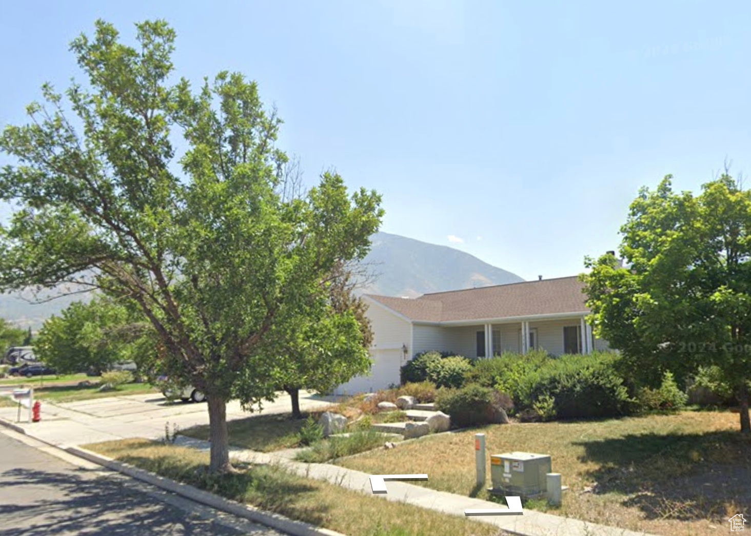 Sale failed due to finances.  Price reduced.  Beautifully remodeled Tooele home! This spacious 5-bedroom, 3-bath home has been tastefully updated throughout with new carpet, laminate flooring, quartz countertops, brushed gold fixtures, and elegant lighting. Enjoy an open and comfortable layout with plenty of natural light and room to gather. 100% fully finished basement.   Outside, the backyard provides room to play and relax with mountain views all around. Conveniently located near schools, parks, and shopping, this move-in-ready home is the perfect blend of comfort, style, and location.