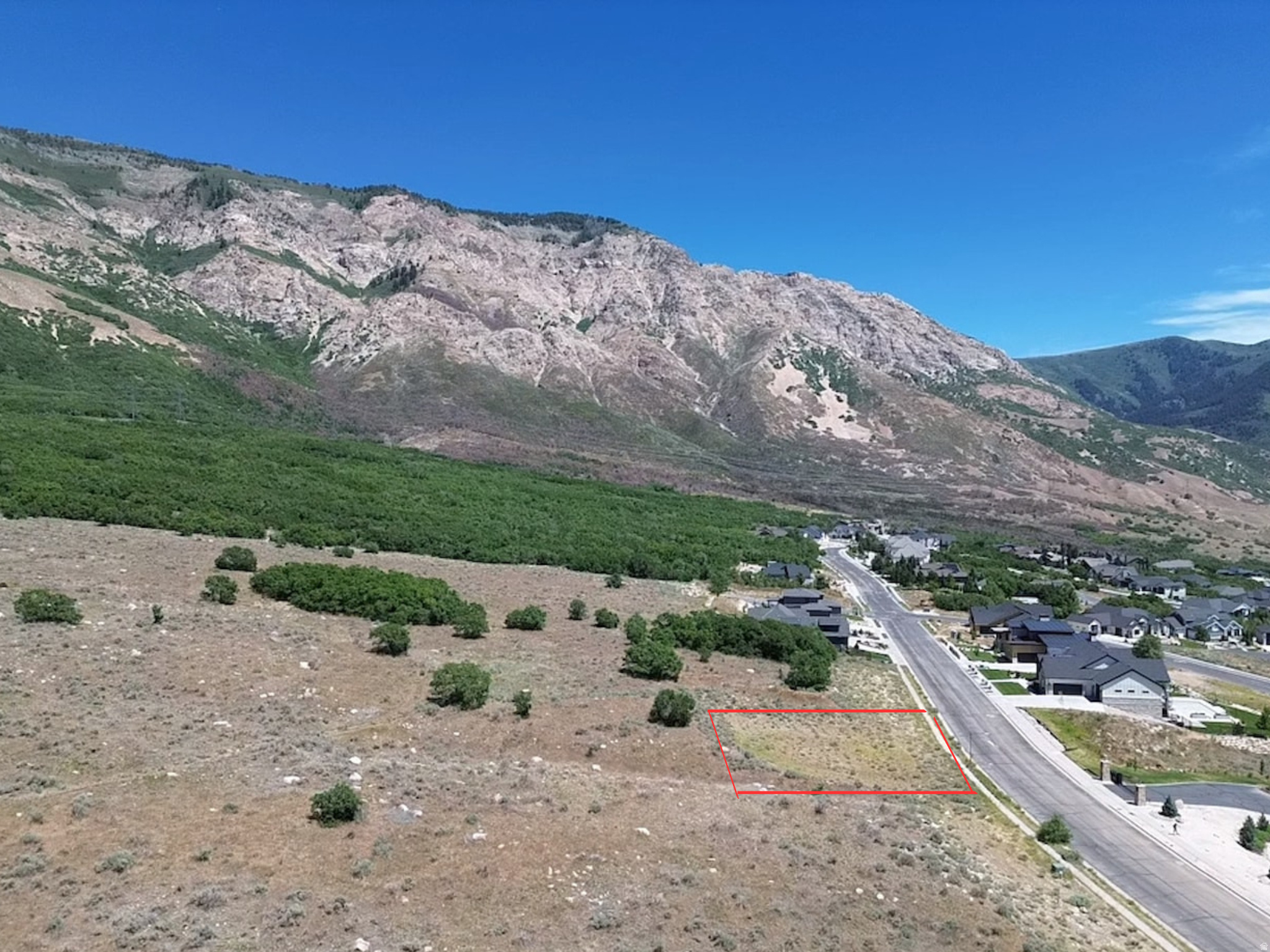 Located in the prestigious community of The Cove, this lot offers a rare opportunity to build your custom dream home in one of North Ogden's most desirable neighborhoods. Surrounded by breathtaking mountain and valley views, the property provides a peaceful and scenic setting with plenty of room to bring your vision to life. Bring your own builder and create a home that perfectly complements the beauty and character of this exceptional location.