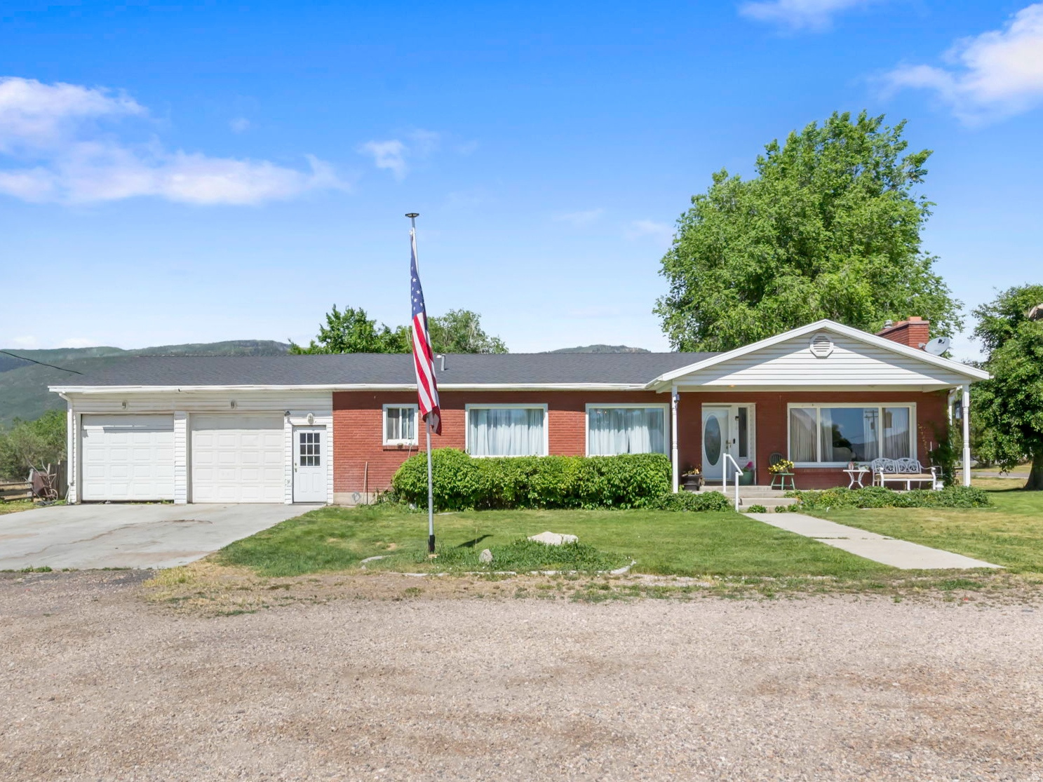 Red brick rambler on a large corner lot with tons of space inside and out! Features a renovated kitchen with all appliances included and a brand new furnace. The main family room has a built-in fireplace and the master suite comes with a dual-sink vanity. The attached 2-car garage includes extra shop space with a wood-burning stove, perfect for projects year-round. Come take a look!  Square footage figures are provided as a courtesy estimate only and were obtained from county records. Buyer is advised to obtain an independent measurement.