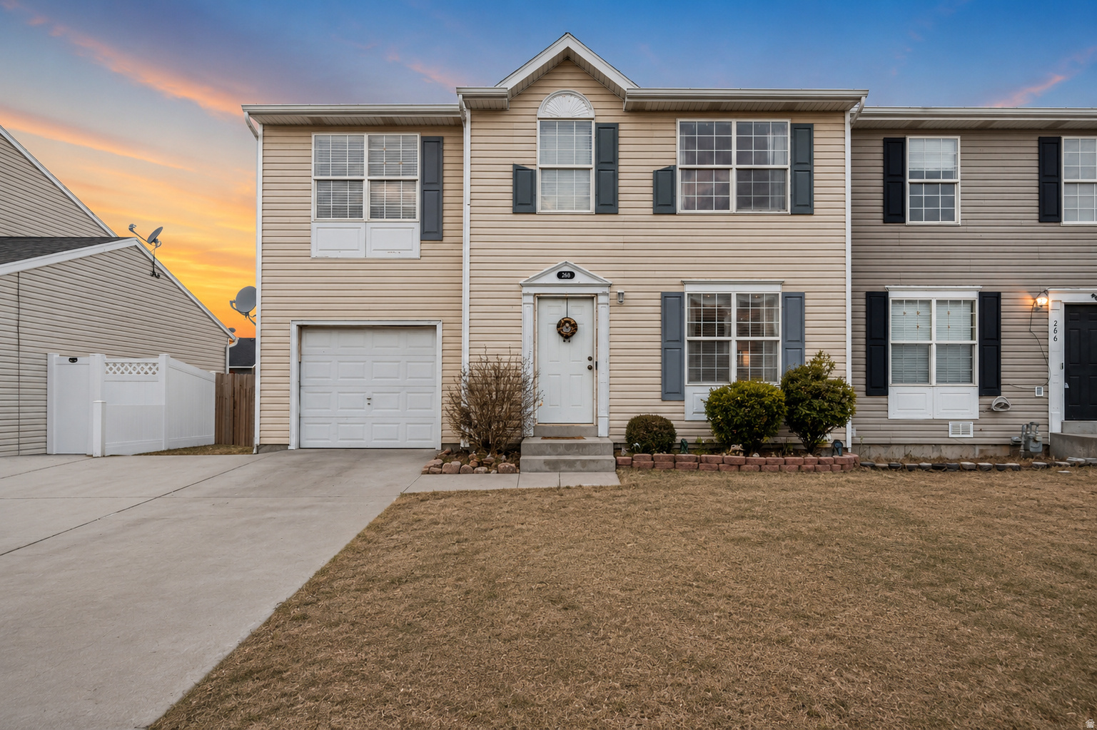 **No HOA! Great Opportunity in Tooele with Mountain Views**  Bring your vision to this spacious **4-bedroom, 3-bath twin home** featuring **1 full bathroom and 2 three-quarter bathrooms** in a desirable Tooele location. With **no HOA**, you'll enjoy added flexibility and fewer restrictions while creating the home you've always wanted.  Inside, you'll find a functional floor plan with a welcoming kitchen and dining area accented by a charming **wainscoting feature wall**. The attached garage includes **built-in shelving and storage**, offering plenty of space for organization.  This home could benefit from **new carpet** and a little **TLC**, including addressing a few minor deferred maintenance items, making it an excellent opportunity for buyers looking to add their own personal style and build equity. Outside, you'll enjoy **beautiful mountain views**, a **mature fruit tree**, and a backyard that is ready for your landscaping ideas, as it currently has **no finished landscaping**.  If you're looking for a home with great potential, generous space, and the freedom of no HOA, this property is worth a look. **Home is being sold AS-IS**, and the list price reflects its current condition.  *Square footage figures are provided as a courtesy estimate only. Buyer is advised to obtain an independent measurement and verify all information.*