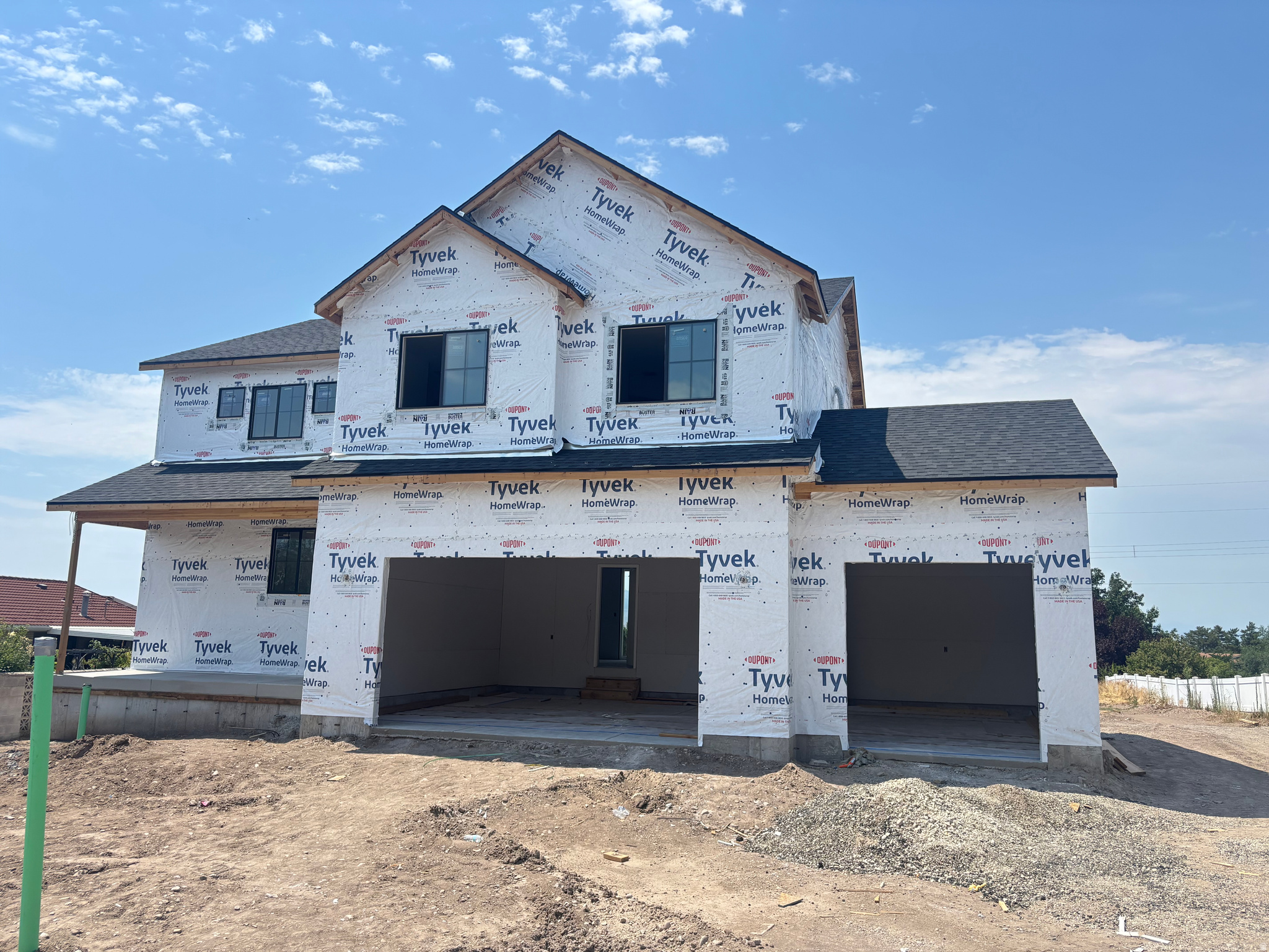 Brand New Home near UVU with ADU and separate entrance! This home has a total of 6 Bedrooms, 3.5 baths, 2 kitchens, 2 laundry hookups, and upgrades galore! Thick edge quartz & granite tops, double oven range, custom tile work, fireplace, large family room, and spacious 3 car garage make this a must see.   This home has a gorgeous view to Utah lake, a large .36 acre lot, large deck for a view, and is constructed with 4 sides of hardi board (NO stucco for maintenance issues longterm), and has room for a large yard for an entertainers dream. Permitted ADU for income and rental potential make this a great value for any investor or buyer.   Square footage figures are provided as a courtesy estimate only and were obtained from the plan.  Buyer is advised to obtain an independent measurement.