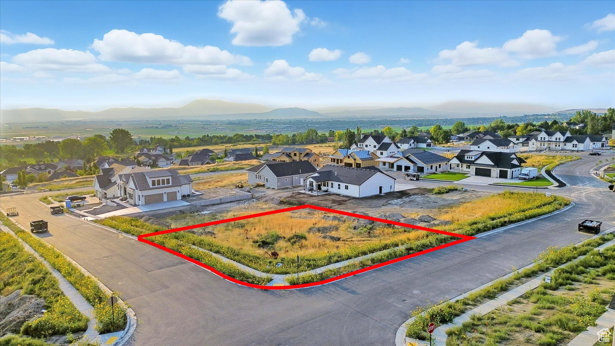 This .29-acre East Bench lot #11 offers some of the valley's most breathtaking views and the perfect setting for your dream home. With an ideal size for flexible design, the property allows for the potential of a walkout basement and minimal excavation, streamlining your build process.  Seize the opportunity to create a custom retreat in Hyde Park's most desirable new community-welcome home to Cedar Bluffs.