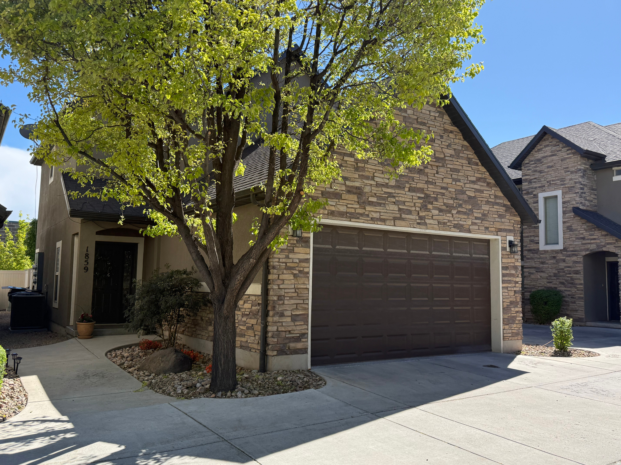 This cozy townhouse in Valentine Estates, just off Redwood Road, is move-in ready and beautifully maintained! The main level features a welcoming open concept with a foyer, spacious living and dining areas, a functional kitchen, plus a versatile bedroom or office and a full bathroom. Upstairs, you'll find a bright loft and convenient laundry room, along with two primary suites. One suite offers a walk-in closet and a private bathroom with separate tub and shower, while the other includes dual closets and a tub/shower combo. The extra-long garage provides ample storage, enhanced by added overhead storage lofts. Recent upgrades include epoxy flooring in garage, a new 95% efficient furnace (with a 6-year warranty and parts), air conditioning, and a water heater. New energy efficient privacy blinds throughout, washer and dryer, new water softener, and a Reverse Osmosis Water Filtration System are also included. Step outside to a fully fenced backyard with no rear neighbors-offering rare privacy and a peaceful setting. Ideally located near Salt Lake City International Airport, Hill Air Force Base, downtown Salt Lake City, and with quick access to I-15, Legacy Highway, and I-215. Close to shopping, schools, and local amenities, this townhome combines comfort, convenience, and value. Showings by appointment only. Please provide at least 2 hour notice for showing appointments.
