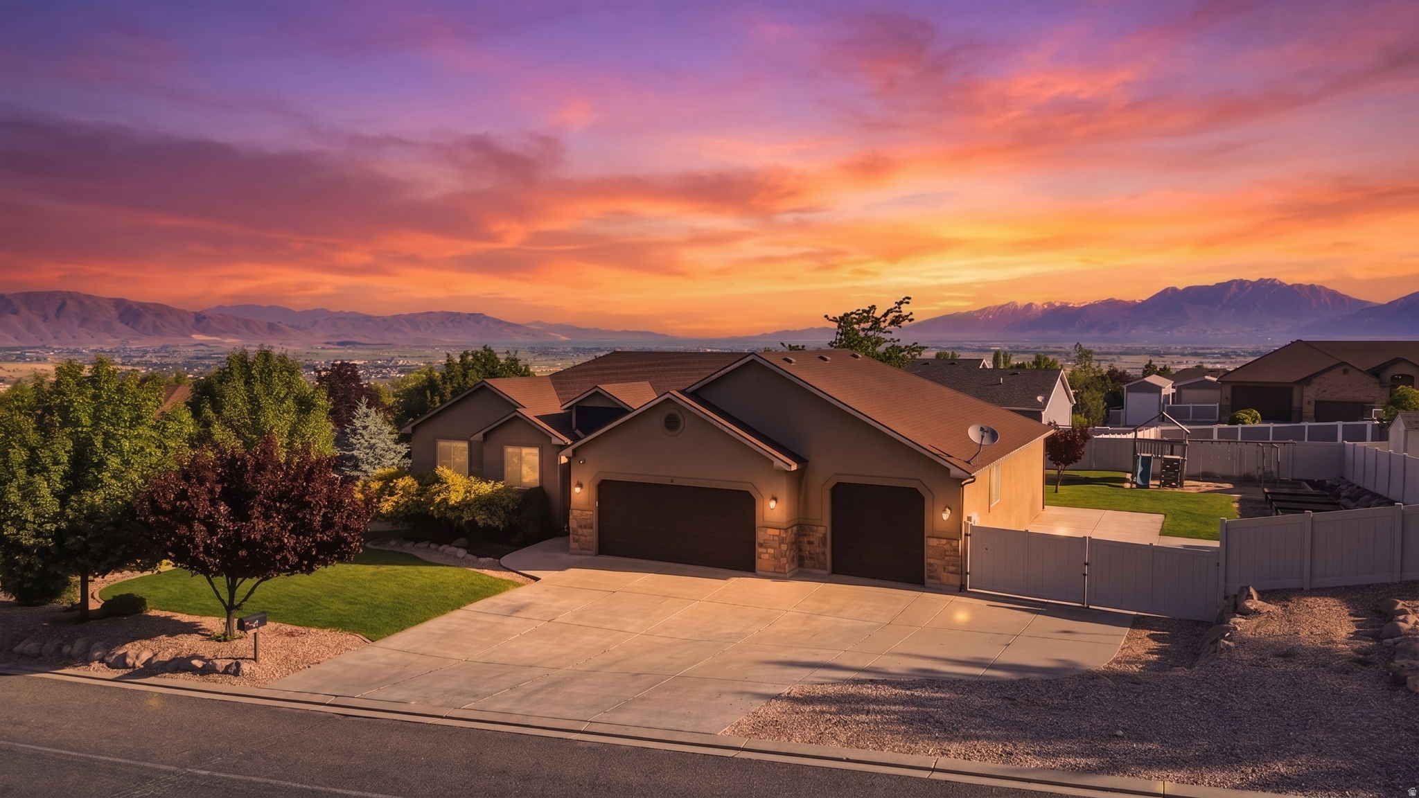 Welcome home to Elk Ridge! This beautiful rambler is not only close to an amazing park and Gladstan Golf Course, it also features breathtaking views in every direction you look! Whether you love gazing at the mountains, valley or lake, you can take it all in from the comfort of your own home! Over 1/3 acre, with a second kitchen in the basement and space to easily convert to a mother in law or accessory apartment, there's room for all of your needs. 6 bedrooms, 3 full bathrooms, extra large laundry room on the main level, walk in pantry, tons of cabinet space in the main kitchen, vaulted ceilings, entrance to the deck from the master bedroom,  extra deep 3rd car garage, extra electrical for RV hookups, in-ground trampoline, and many more features are sure to make you fall in love! Be sure to try the 3D virtual tour, then come tour in person for the full experience!