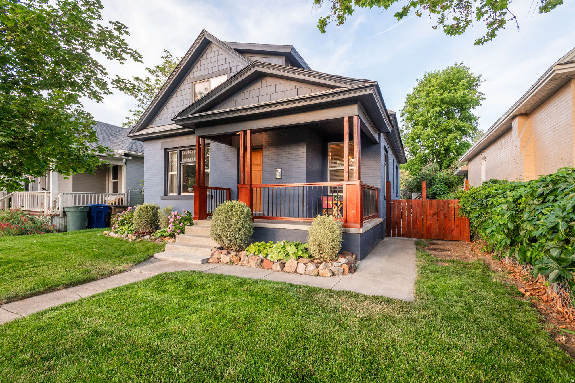 Don't miss this 2-Story stunner that combines modern craftsmanship with historic presence. This stately but welcoming 1912 beauty features brand new white oak hardwood floors with exposed brick and soaring ceilings on the main floor, where light pours through from every angle. At its center is a fully renovated open kitchen, featuring cherry wood countertops, new cabinets and custom tilework. The second level master bedroom has spacious storage, ample light and room to spare. The custom woodwork adorned entryway lends a sense of artistry. Splashes of wood and color shine throughout. The beautifully landscaped grounds feature a peaceful garden area and a pathway that leads to a rare and spacious detached two-car garage with RV parking and convenient alley access. This stunner is Impeccably updated and ready to welcome its next discerning owner!