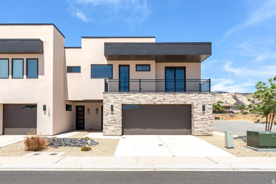 New built nightly rental approved townhome in the exciting new Hillcrest subdivision in the prestigious Ledges golf course community. This 4 bedroom 4.5 bath features large great room downstairs and upstairs with big entertaining area. Amazing views of Snow Canyon state park and Fish Rock. This townhome comes with many upgrades such as multi-slide doors and waterfall edge quartz. Large community pool and hot tub for residence use only! Directions: