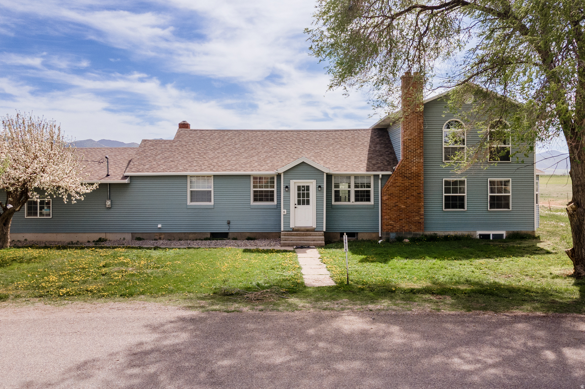 Welcome to your Idaho lifestyle dream! Situated on over 4 acres in beautiful Marsh Valley, this spacious and updated property offers the peace, privacy, and flexibility that so many buyers are searching for. With open living spaces, room to roam, and incredible country views, this property is ideal for those looking to escape crowded subdivision living and enjoy the freedom of rural Idaho life.  The home features multiple living areas, large bedrooms, and a functional layout designed for real life. A separate entrance with additional kitchen and laundry setup creates excellent potential for multi-generational living, guest space, rental income, or flexible living arrangements.  Outside, the possibilities are endless. Bring your animals, build your dream shop, start a hobby farm, garden, or simply enjoy the open space and quiet surroundings. There is ample room for toys, trailers, RV parking, and all the outdoor living Idaho is known for.  Located within reach of Pocatello while offering the charm and slower pace of Marsh Valley living, this property is a rare opportunity to own acreage, privacy, and versatility all in one package.  Idaho is more than a place to live - it's a lifestyle. Come experience it for yourself!
