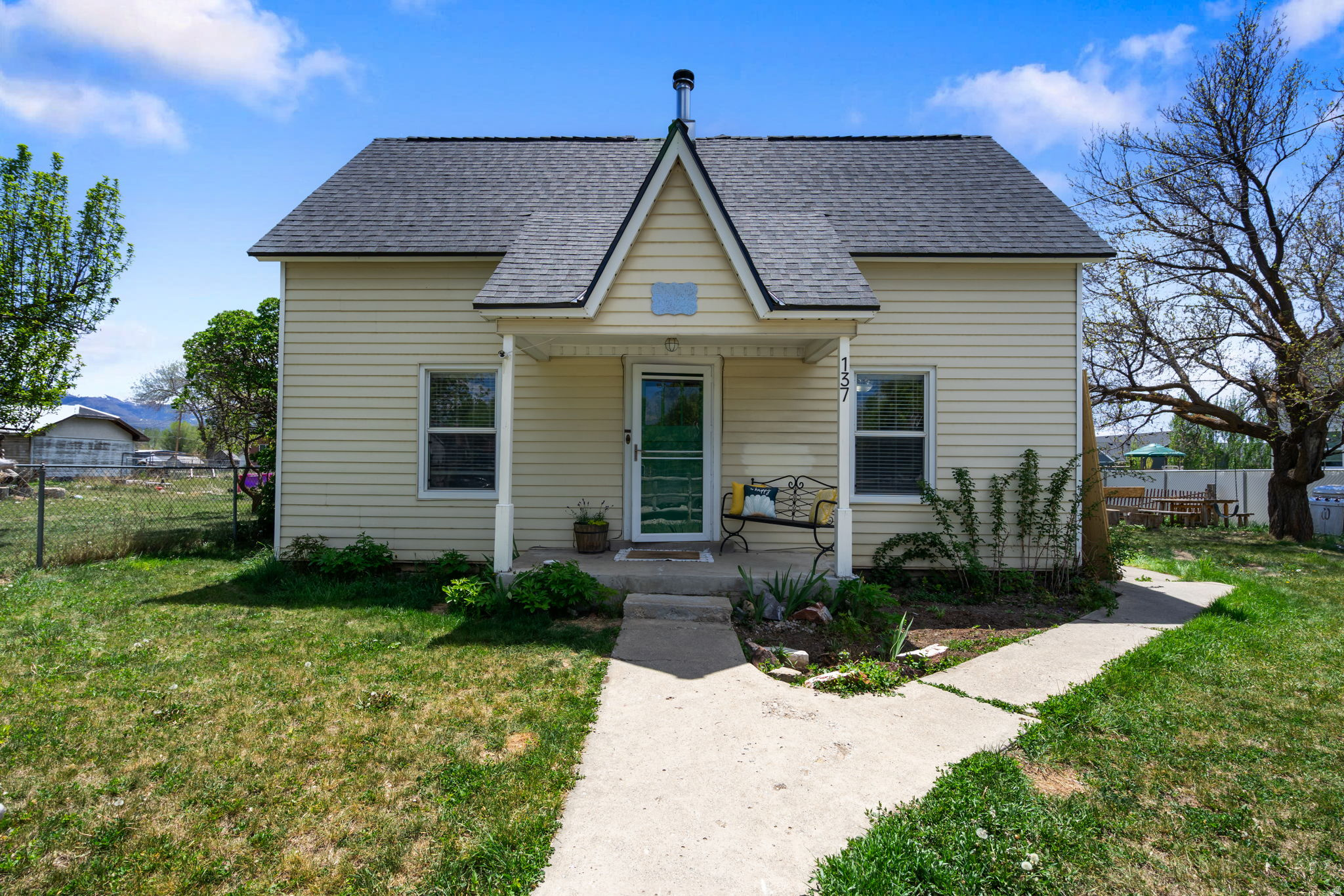 The cutest Fairview charmer! This adorable 3-bedroom, 2-bath home is full of warmth and character, featuring a classic kitchen with timeless appeal. Upstairs offers a wonderful separate living space with a bedroom, bathroom, and family room, perfect for guests, teens, a home office, or simply extra room to spread out. Nestled in a quaint, charming neighborhood, this home has all the cozy small-town feel you've been looking for.