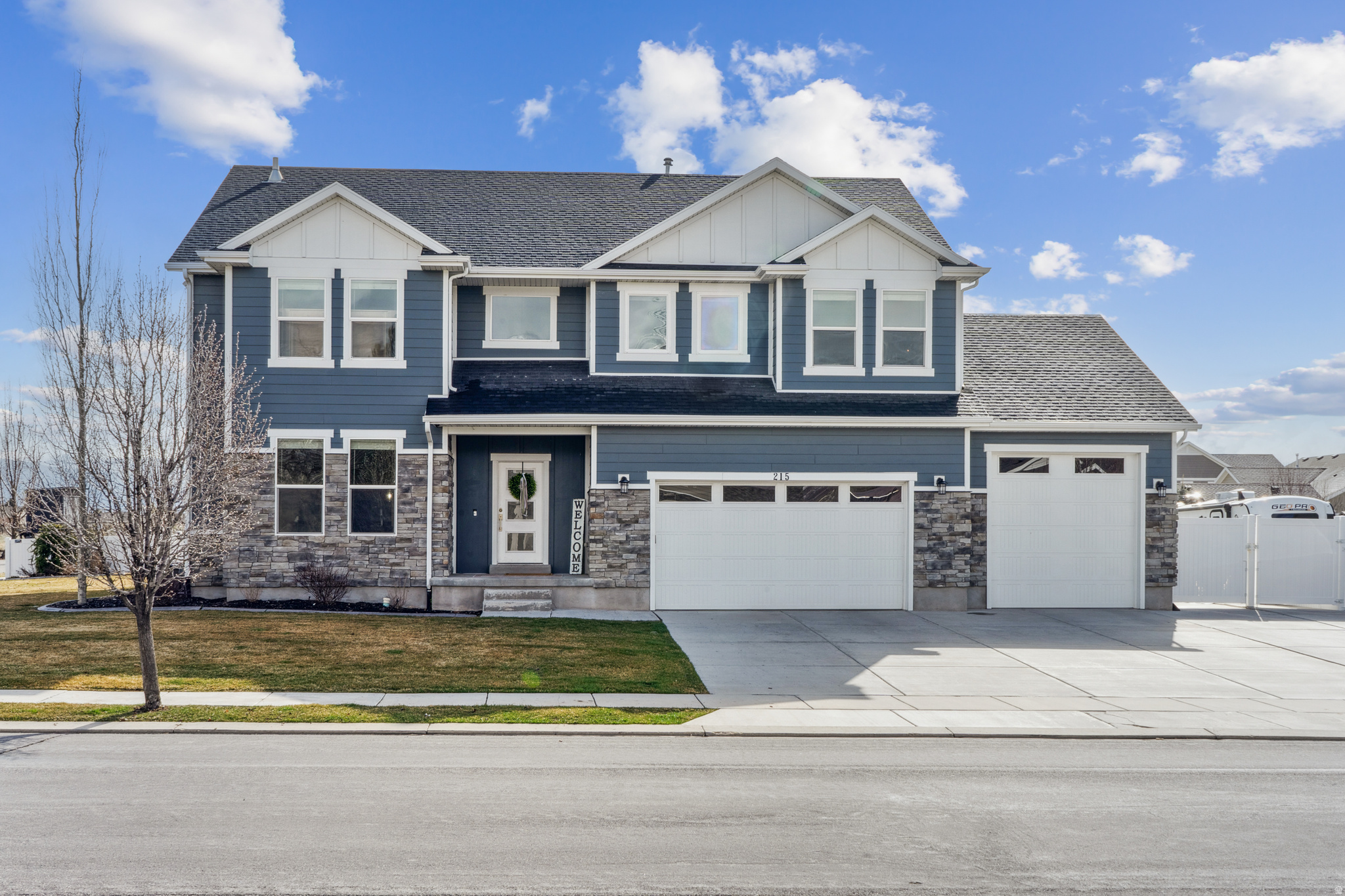 It's easy to call this stunning home HOME. Featuring 6 bedrooms, a 3-car garage, and an inviting open floor plan-especially on the main level-this home is designed for both everyday living and effortless entertaining. Gatherings with family, friends, and neighbors are a breeze in the beautiful kitchen with gorgeous quartz countertops and a large island that flows seamlessly into the dining area and cozy living room, complete with a fireplace and sliding glass doors leading to the back patio. Upstairs offers four bedrooms, a spacious loft-style family room, a full bathroom, and a convenient laundry room. The primary suite is a true retreat, featuring a generous walk-in closet and a luxurious bathroom. The fully finished basement adds even more living space with a family room featuring surround sound, a wet bar area, two additional bedrooms, and a pristine bathroom. The home has been immaculately maintained, with new carpet installed throughout last summer. Storage is abundant throughout the home, garage, and backyard shed. The high-ceiling garage spans over 1,000 square feet and includes a sink, new insulated garage doors, and a 220V outlet for electric vehicles. A gated concrete RV pad sits behind the fence while still allowing ample driveway parking. Outside, enjoy mature raspberry bushes and a Wi-Fi-enabled sprinkler system for easy management right from your phone. Even more impressive are the gorgeous views of Mt. Timpanogos from every west-facing window and the welcoming front porch. There are truly so many exceptional features-this is one you must see in person. Square footage figures are provided as a courtesy estimate only. Buyer is advised to obtain an independent measurement.
