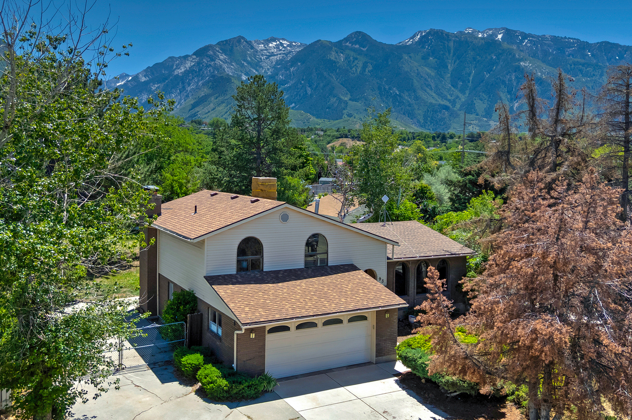 Nestled in the highly desirable East Sandy area, this beautiful home offers the perfect blend of mountain living and everyday convenience. Enjoy breathtaking mountain views from the spacious deck overlooking a huge backyard. Located just minutes from world-class ski resorts, hiking, and outdoor recreation, while also providing easy access to shopping, dining, and major commuter routes. Situated within one of the area's most sought-after school districts, this property offers an exceptional lifestyle for families and outdoor enthusiasts alike. Extensive updates can be found throughout the home, including complete remodels of all three bathrooms. Each bathroom showcases beautiful, quality tile work.