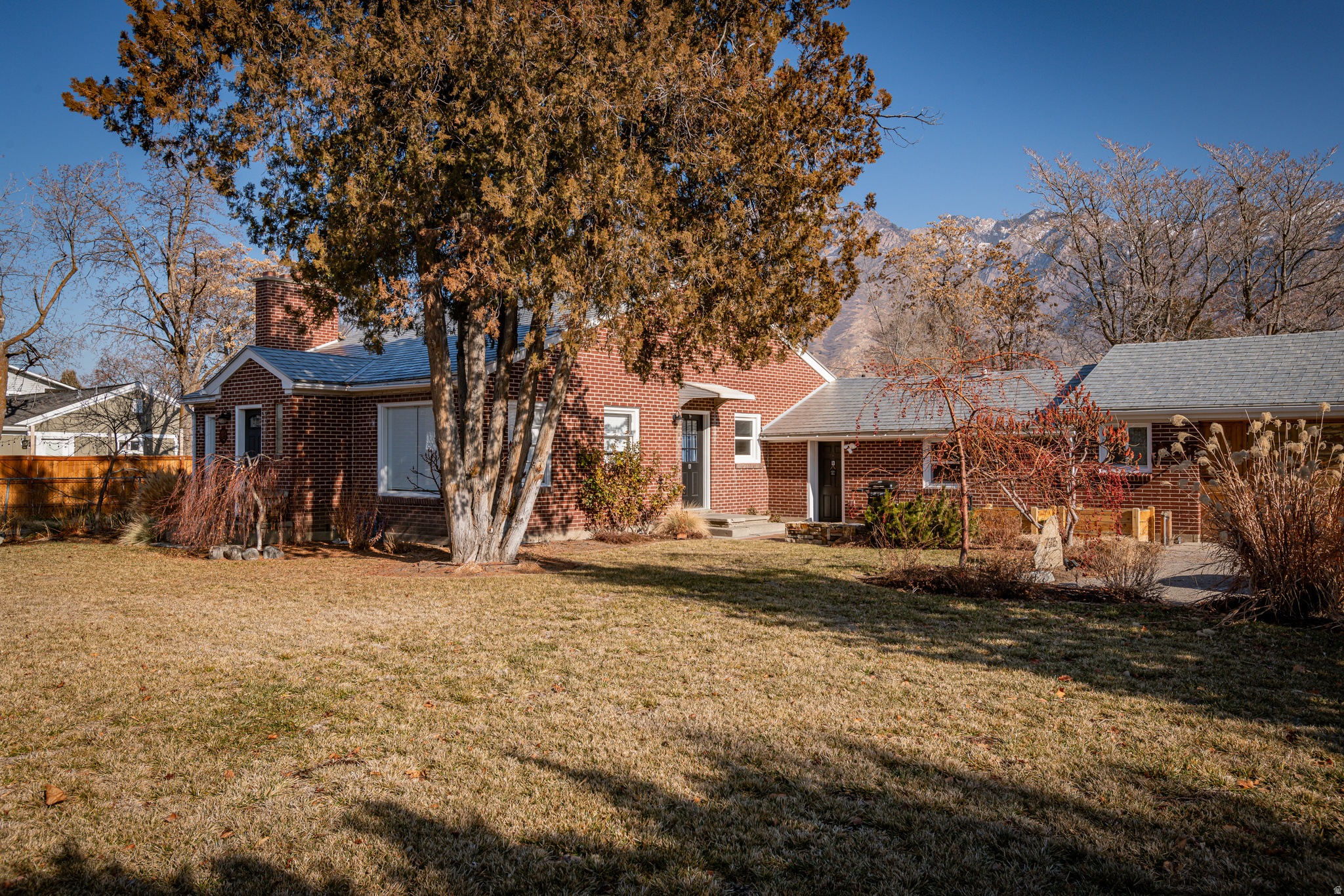 Don't miss this unique opportunity in Cottonwood Heights. This charming, fully remodeled home blends character and functionality with original hardwood floors, stainless steel appliances, and butcher block countertops. A second bathroom in the main home was thoughtfully added just 2 years ago. What truly sets this property apart is its flexibility-it's legally approved as a duplex and for short-term rentals. Whether you're looking to offset your mortgage by renting out part of the home, or maximize income by renting both units, the options are endless. Each unit has its own kitchen, bathrooms and laundry rooms. Each also has a private backyard space, and the property includes a garage currently being converted into a potential third unit, with major components already in place and materials included. With plenty of parking, including RV space, this is a rare find offering both lifestyle and income potential in a highly sought-after area.