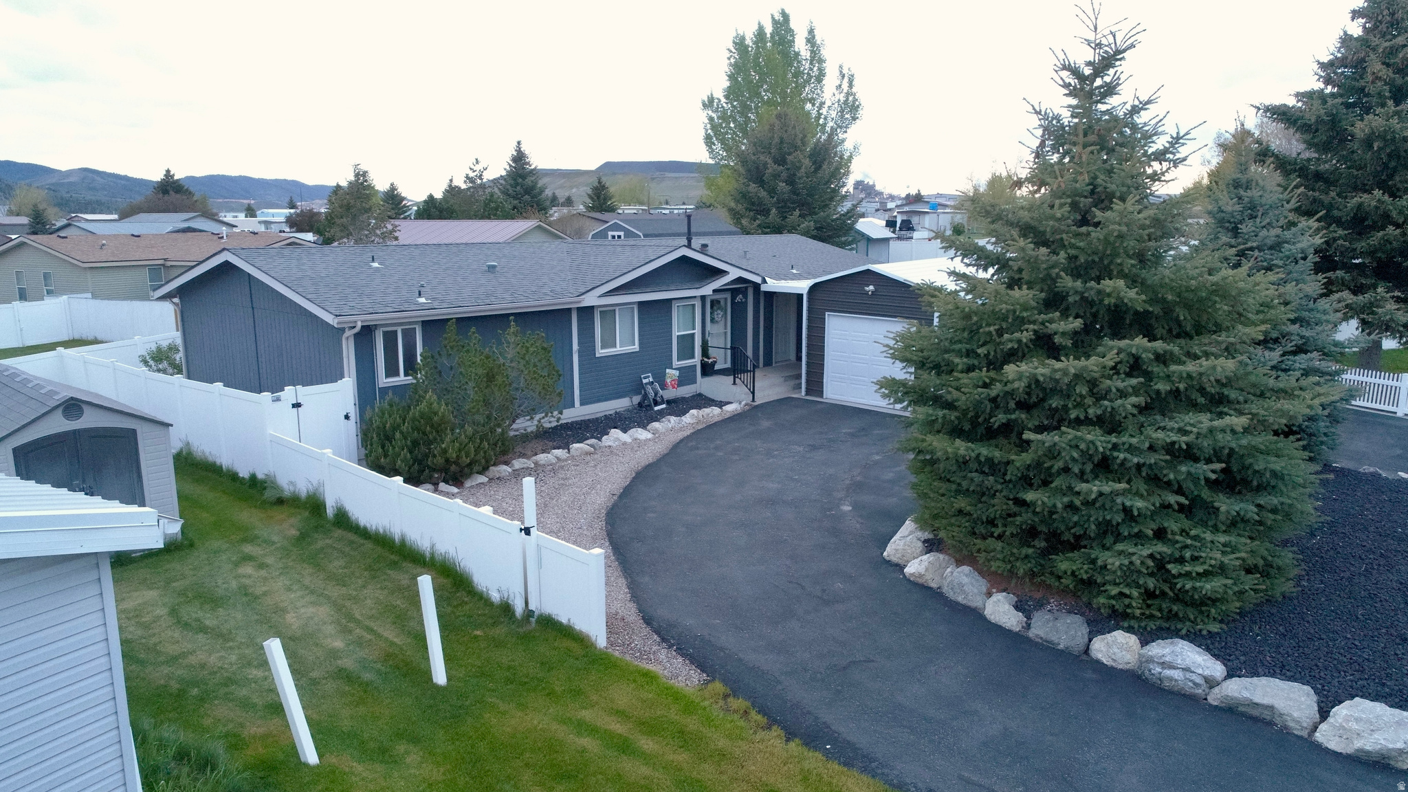 Single Level Living at It's Finest! This Move-In Ready Home in Soda Springs, Idaho has 4 Beds, 2 Baths, 1,620 Sq. Ft. on .2 Acre With SO MANY Upgrades! Meticulously Maintained with Lots of Updates Made Within the Past 5 Years, Which Include: New Roof (2025), Newer Appliances, New Detached Garage with Covered Walkway, New Carpet and Premium Padding, New Anderson Windows on the West Side of the House, Custom Built Pergola, Vinyl Gates and Concrete Walkways, Electrical Added to Storage Shed and Garage, Many New Light Fixtures and VERY Low Maintenance Landscaping. Plus, the Interior Has Updated Painting and Stylish "Stone-Look" Wallpaper on a Feature Wall in the Living Room. You're Sure to Enjoy the Natural Lighting Throughout, Circle Driveway, Vaulted Ceilings, Air Conditioning, Storage Shed, Fenced-In Backyard, Open Floor Plan and the Large Master Suite! Covered Patio Space Makes a Great Area for Entertaining and It's Tucked into a Cul-De-Sac Just Minutes from Kelly Park with LOTS of Outdoor Adventuring! Call Listing Agent Today to See It For Yourself! Would be PERFECT for a Retiree!!