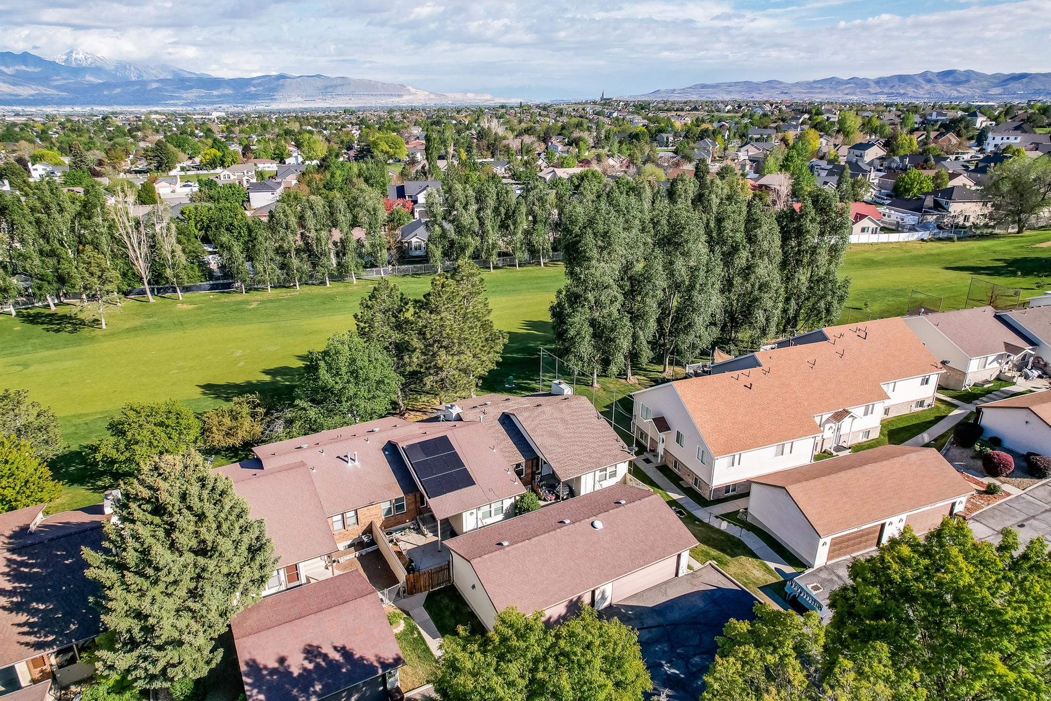 Opportunities like this are the bargain everyone is looking for - don't miss out! Home with Brand new solar system (Nov 2025), ADU (2023),  a two-car garage, 2023 kitchen remodel, and new flooring throughout much of the main level. The ADU has a separate entrance, currently rents for $1,600/month and can be a fantastic supplement to your monthly income / payment. Information deemed reliable, but not guaranteed. It is also Glenmore golf course adjacent, A short walk to the Bingham Creek Trail head, and Close to a Trax station,  Buyer is advised to independently verify all information
