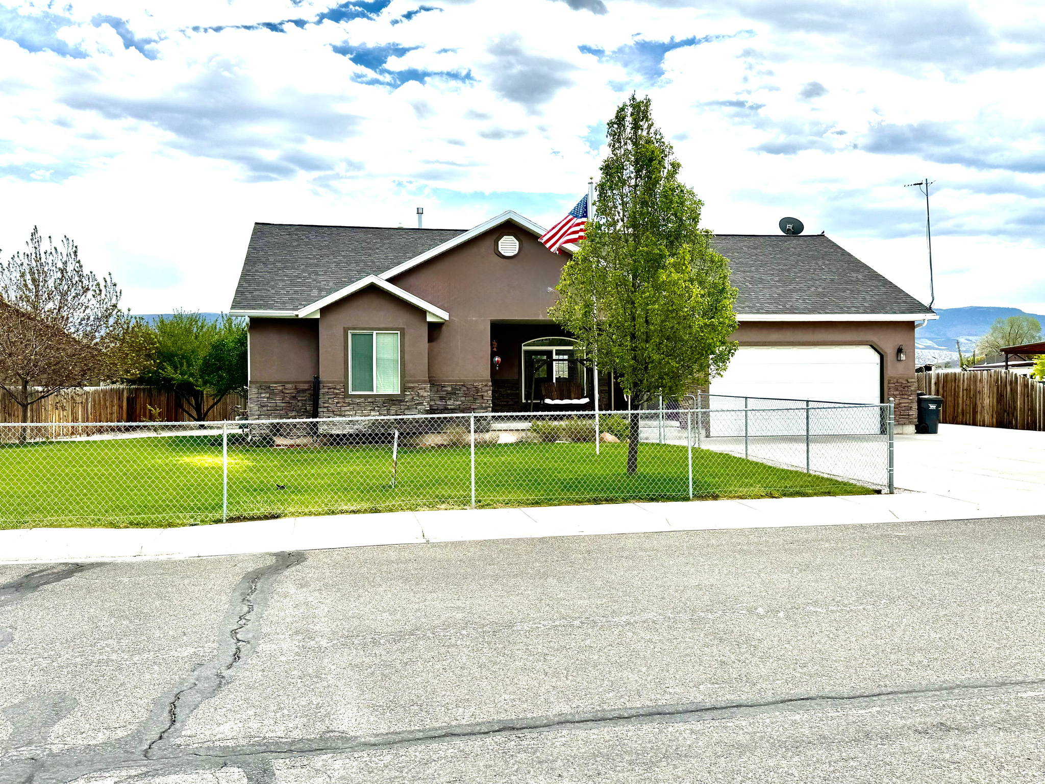 Welcome to this well maintained and thoughtfully designed home  offering space, comfort, and an ideal location. This fully finished residence features 5 bedrooms and 2 bathrooms and sits on a generous .38-acre fully fenced lot, providing both privacy and room to enjoy the outdoors. As you enter the home, you are greeted by vaulted ceilings that create an open and welcoming atmosphere in the main living areas. The home offers formal living rooms on both the main level and the basement, making it perfect for entertaining, multi-generational living, or simply enjoying separate gathering spaces. The layout is functional and spacious, allowing for flexibility to meet a variety of lifestyle needs. The kitchen is warm and inviting, complete with ample cabinetry and a china hutch that will stay with the home, adding character and practical storage. Downstairs, the fully finished basement provides additional living space and features a cozy wood stove, creating a comfortable retreat during the colder months. A dedicated food storage room adds valuable space for organization and long-term storage. Outside, the property truly shines. The fully fenced yard offers a safe and private area for pets, play, or entertaining. Enjoy the mature landscaping and established fruit trees, including two apple trees, two pear trees, and two plum trees, perfect for homegrown harvests. A storage shed provides extra space for tools, equipment, or hobbies, while the two-car garage offers convenient parking and additional storage. This home is ideally situated within walking distance to the elementary, middle, and high schools, making it an excellent choice for families. With its generous lot size, finished living spaces, and desirable neighborhood location, this property offers a rare combination of comfort, functionality, and convenience. Don't miss the opportunity to own this well-maintained home. Square footage figures are provided as a courtesy estimate only and were obtained from Sanpete county recorders office. Buyer is advised to obtain an independent measurement.