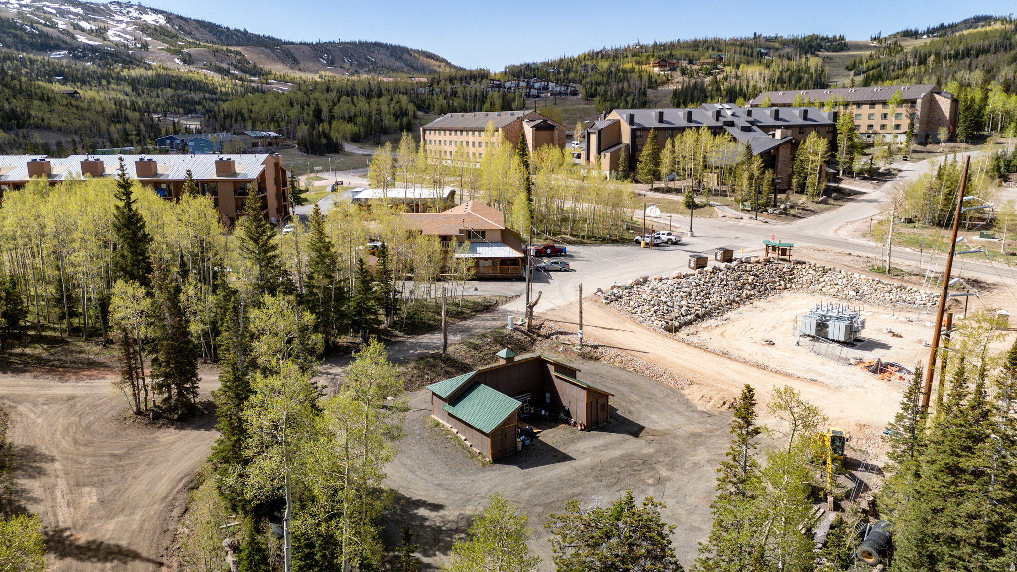 Rare Business Opportunity in Brian Head! This 0.47-acre property has a prime location just off Hwy 143 and approximately 100' (+/-) from the Town ATV/Snowmobile Trail. Zoned Light Industrial - 1 of only 3 such parcels in town - with potential for additional zoning possibilities, this property offers outstanding flexibility for business, investment, or mixed-use development. Ideal for dual-use concept with commercial space below and residential living above. Property is graded and finished with a durable RAP surface for functionality. Heated workshop included with electricity, offering immediate workspace or storage, and it can easily be relocated if desired. All utilities have been extended into the lot. Survey and geotechnical report have been completed and are available upon request.