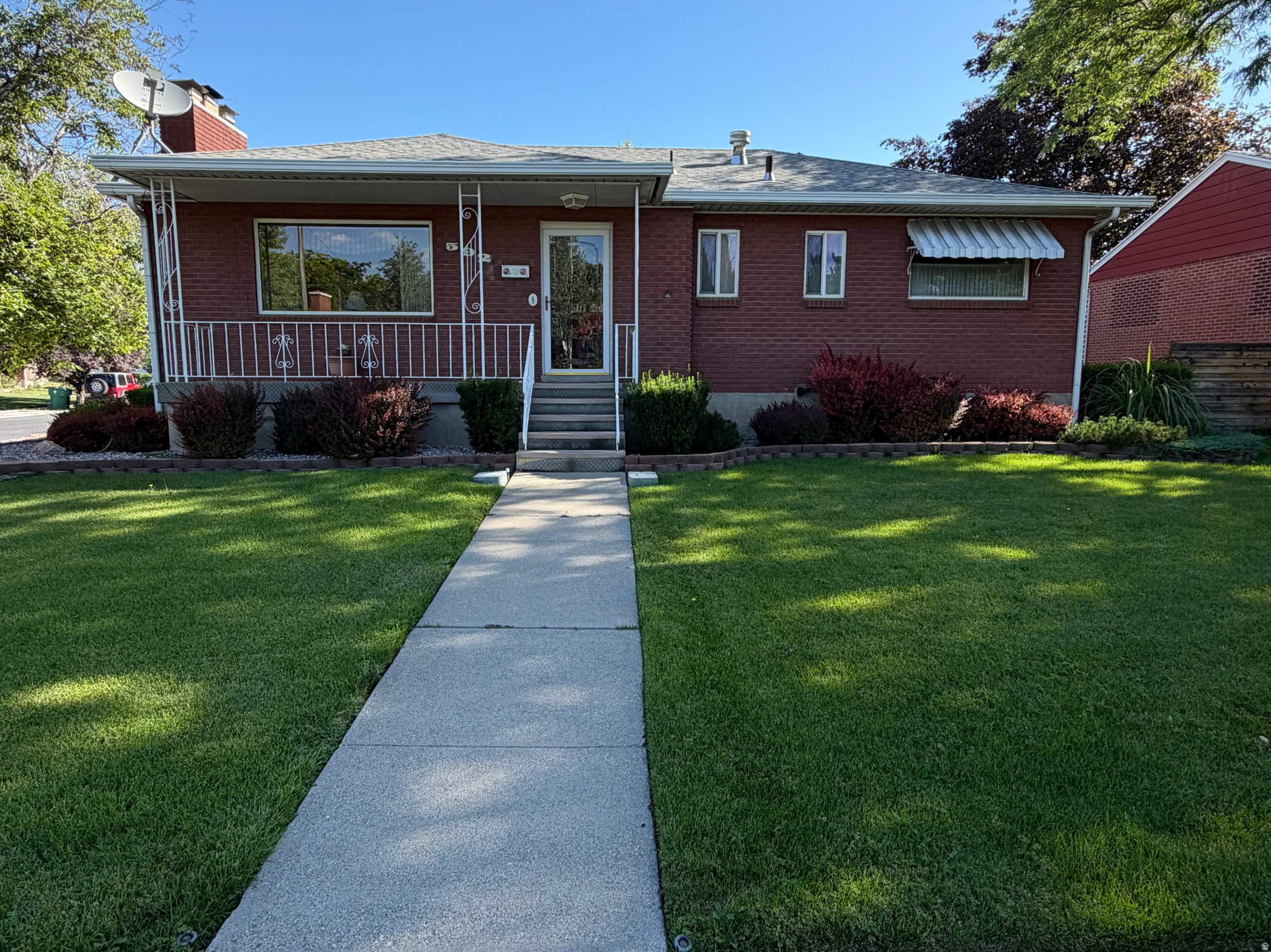 Proudly offered for the first time in nearly 70 years, this classic red brick corner-lot home has been lovingly maintained by its original owners and is ready for its next chapter. From the beautifully manicured front and backyard to its timeless charm, pride of ownership is evident throughout. Inside you'll find a clean, well cared for home offering 4 bedrooms, 1.5 bathrooms, 2 kitchens, and a separate basement entrance. While the interior retains its original character , it presents an exceptional opportunity to update and customize to your personal style. The flexible layout offers potential for multi generational living or the possibility of living upstairs while utilizing the lower level for additional living space or rental potential (buyer to verify all rental and zoning requirements). Additional features include a detached 2 car garage ,backyard storage shed, and a spacious yard with mature landscaping. Conveniently located in the heart of Murray, you'll enjoy easy access to parks, schools, shopping,dining, and major commuter routes. A rare opportunity to own a lovely cared for home with endless potential in one of Murray's most established neighborhoods. Additional photos coming soon. Limited photos are available at this time.   Square footage figures are provided as a courtesy estimate only and were obtained from ______________ .  Buyer is advised to obtain an independent measurement.