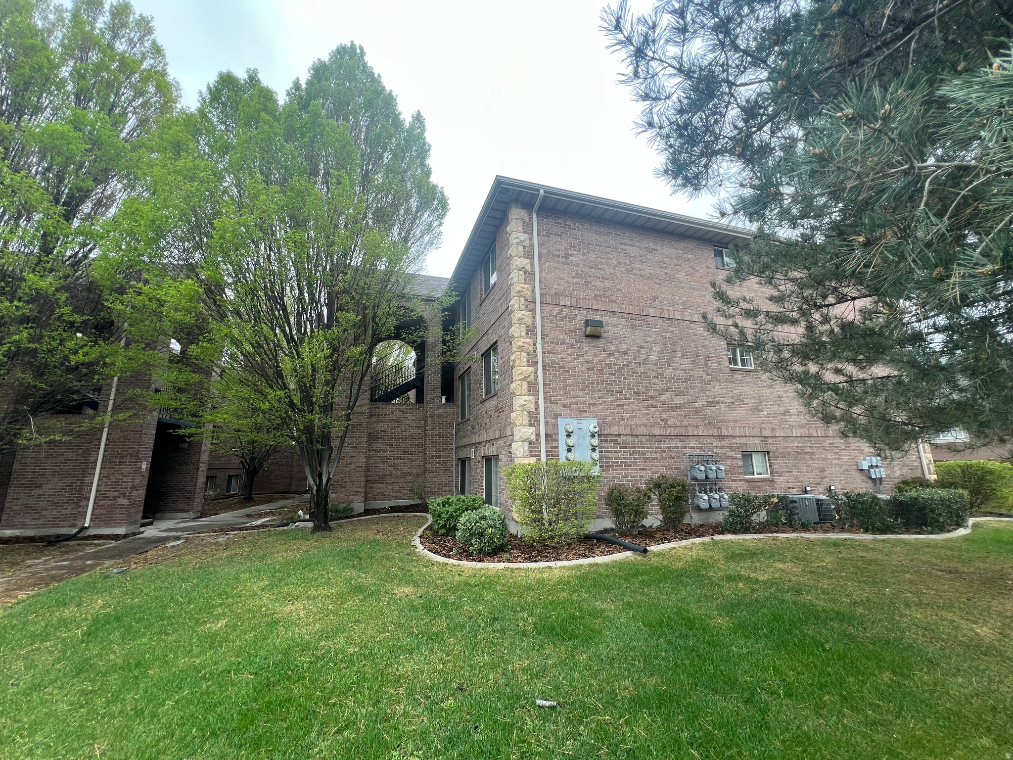 Beautiful condo in desirable northeast Orem-one of the lowest-priced properties in the area! This move-in-ready unit features brand new paint, carpet, appliances, and updated light fixtures, giving it a fresh, modern feel from the moment you walk in. Located on the third floor, you'll enjoy added privacy with no upstairs neighbors, along with great natural light and open views. The spacious primary bedroom includes its own en suite bathroom, and with a total of 3 bedrooms and 2 bathrooms, with large closets, there's plenty of room to fit your needs. Washer, dryer, and refrigerator are all included, and you'll love the large laundry and storage room with built-in shelving-hard-to-find extra space that makes a big difference. The HOA fees are lower than many comparable properties, helping keep your monthly payment more affordable. Conveniently located just minutes from shopping, freeway access, Provo Canyon, and local schools and universities-this is a great option for both owner-occupants and investors alike. Easy to show - come take a look!