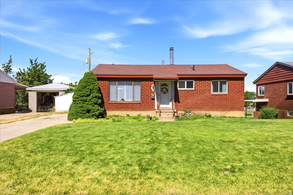 Welcome to this charming 1954 home located in a desirable, established neighborhood! Featuring 5 bedrooms and 2 bathrooms, this property offers a fantastic opportunity to add your personal style and make it truly your own. Several key updates have already been completed, including a remodeled upstairs shower in 2023, a new furnace and central A/C system installed in 2024, and a roof replacement approximately five years ago, providing added comfort and peace of mind. Ideally situated near Bonneville Park, you'll enjoy easy access to green space, recreational activities, family gatherings, and relaxing evening walks. Whether you're looking for your first home, an investment opportunity, or a place to create lasting memories, this well-loved property is full of potential.