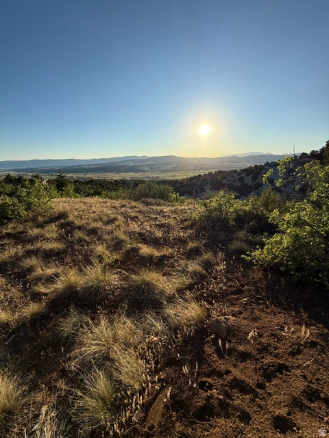 Mountain view lot with year-round access and improvements already in place! Septic tank is installed, culinary water is connected, and power is available at the lot. Located less than one mile from the gated entrance, this property is ready for your RV, dream cabin, or both. Enjoy cool mountain air, abundant wildlife, and endless recreation just minutes from the Manti-La Sal National Forest and Skyline Drive Trail System, offering ATV trails, hiking, fishing, hunting, camping, snowmobiling, and more. Conveniently located near grocery stores, restaurants, a hospital, hardware store, and other small-town amenities. Propane service available. Google Map/Earth is 39.60401, -111.39614