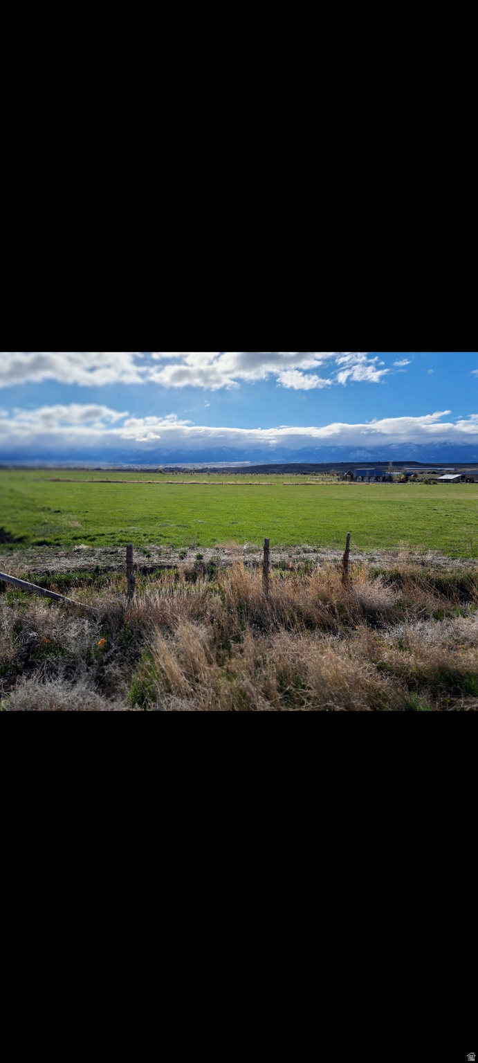 14.86 acres of productive ground east of Moroni with 12 shares of Moroni Irrigation water included! Currently used for hay production and pasture, this versatile property offers the perfect blend of agricultural use and peaceful country living. Enjoy wide open spaces, beautiful rural surroundings, and plenty of room to create your ideal small ranch or hobby farm. You could build your dream home and enjoy the quiet lifestyle this property has to offer but buyer  would need to acquire 1 acre-foot  water right for culinary water prior to  obtaining a building permit for a residence. Great opportunity to own usable acreage in a desirable country setting!