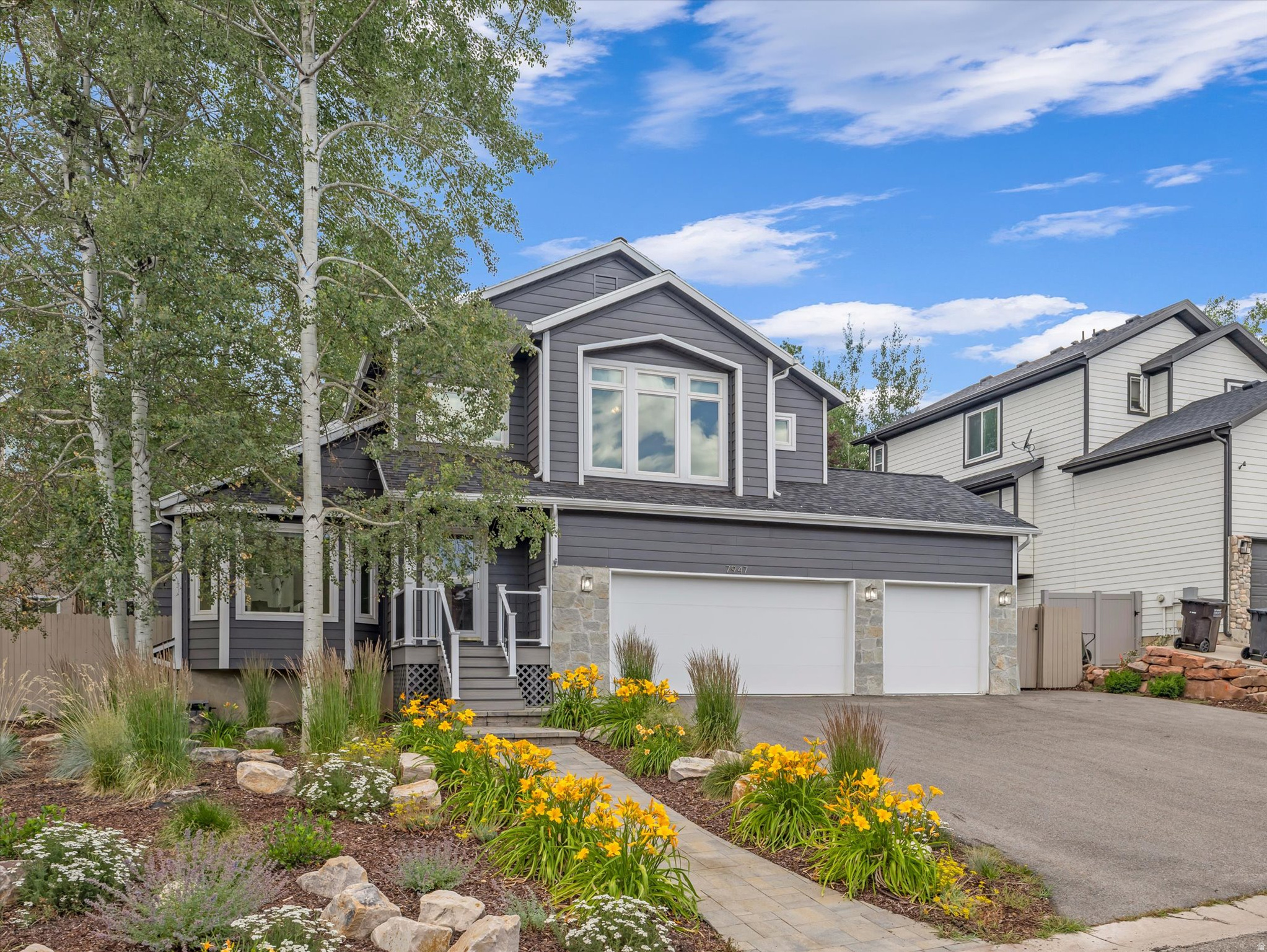 Beautifully updated and thoughtfully maintained, this 4-bedroom, 3.5-bath mountain contemporary home offers the perfect balance of comfort, style, and convenience in one of Park City's most sought-after neighborhoods. Nestled in Pinebrook's Eagle Ridge community, this move-in ready home is surrounded by mature trees and enjoys easy access to miles of hiking and biking trails, top-rated Park City schools, world-class ski resorts, shopping, dining, and I-80 for a quick commute to Salt Lake City. Inside, soaring vaulted ceilings and expansive windows fill the great room with natural light, creating a warm and inviting gathering space centered around the fireplace. The beautifully remodeled kitchen features timeless finishes, generous workspace, and an adjoining dining area with French doors that open to an oversized deck--perfect for summer barbecues, morning coffee, or simply enjoying the peaceful mountain setting. The fully fenced backyard is one of the home's standout features, offering an expansive lawn with plenty of room for children, pets, gardening, or entertaining--an uncommon find in many Park City neighborhoods. Upstairs, the spacious primary suite provides a relaxing retreat with a spa-inspired bathroom featuring dual vanities, a soaking tub, steam shower, and walk-in closet. Two additional bedrooms and a full bath complete the upper level, while the lower level offers a generous family room, fourth bedroom, and full bath--ideal for guests, a home office, fitness room, or playroom. Major improvements completed in recent years provide exceptional peace of mind, including a new roof, furnace, central air conditioning, water heater, windows, deck, patio, and roof heat tape. A three-car garage, oversized driveway, storage shed, fiber optic internet, and abundant storage throughout complete this exceptional home. Offering the perfect combination of updated living, generous outdoor space, and an unbeatable Park City location.