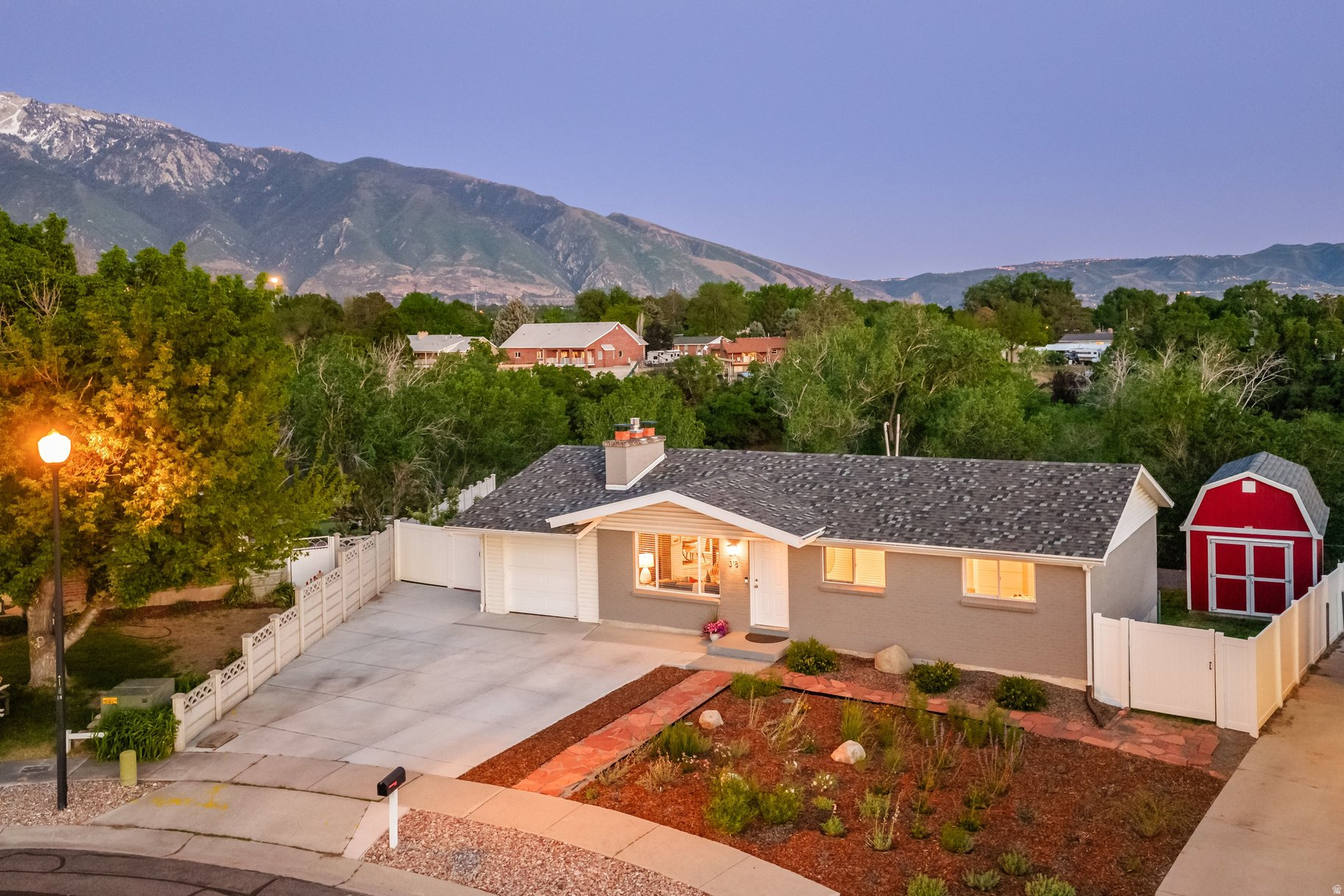 Bordering Dimple Dell Park on a tranquil cul-de-sac,this beautifullyupdated Sandy home combines privacy, outdoor adventure, and spectacular natural surroundings. Sweeping, unobstructed Wasatch Mountain views take center stage,while an inviting L-shapeddeck extends effortlesslyfrom the main living areas, creating a seamless indoor-outdoor flowfor entertaining and relaxation. Thoughtfully renovated from top to bottom, this home blends modern style with easy, move-in-ready comfort. Just beyond a sleek architectural sliding door, the spacious main-level primaryawaits, complete with an oversized walk-in closet and custom built-ins. In the kitchen, quartz countertops, stainless steel appliances, and a breakfast bar with seating come together for a space that's as stylish as it is functional. Xeriscaped front landscaping brings vibrant pops of color with easy-care design, while the flat, grassy backyard is perfect for play, pets, andoutdoor gatherings. A new 10' x 16' storage shed keeps all your outdoor gear and tools neatly organized and out of sight. Recent upgrades add even more peace of mind, including a newer roof, water heater, reverse osmosis waterfiltration system, widened driveway, and water softener. Outdoor lovers, this one's for you. With direct access to Dimple Dell's extensive network of hiking, biking, and equestrian trails, adventure starts practically at your doorstep. Two nearby dog parks at the end of the block keep four-legged friends happy, while a TRAX stop just a five-minute walk away makes getting around a breeze. All of it is wrapped in a peaceful, park-side setting that feels open, serene, and wonderfully connected to nature. Combining extensive updates, spectacular mountain views, and immediate access to some of the area's most sought-after outdoor amenities, this exceptional property offers a lifestyle that is truly difficult to replicate.