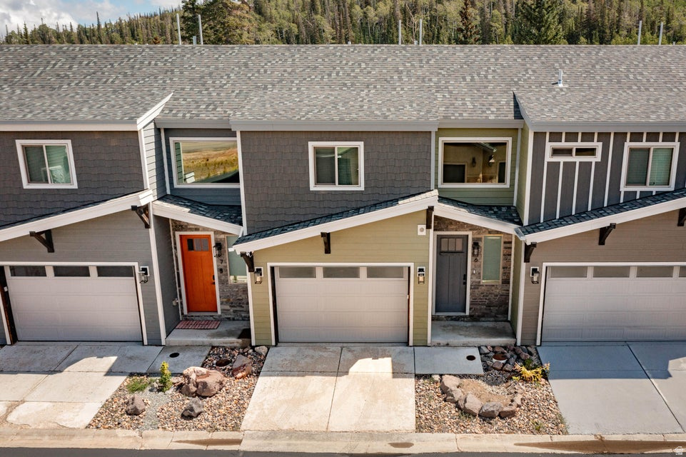 Brian Head Townhome with the Ski Lifts Basically Across the Street | Forget long parking lot walks and hauling ski gear halfway across town. The Navajo chair lifts are right across the street from this three-story Brian Head townhome, which makes first chair a whole lot more realistic. Inside, the main living space is built for post-mountain recovery: open layout, cozy gas fireplace, and enough room for everyone to pile in, warm up, eat, and tell exaggerated stories about the run they definitely almost landed cleanly. The kitchen keeps things modern with stainless appliances, sleek finishes, and enough room to cook for a crowd. Downstairs, the bunk room is ready for the fun group, featuring two triple bunks, an electric fireplace, and its own bathroom. Translation: kids will love it, and adults might try to claim it first. Updated finishes throughout keep the home feeling fresh and comfortable without trying too hard to be fancy. When ski season winds down, you're still close to Cedar Breaks, Giant Steps, Bristlecone Pond, hiking, fishing, mountain biking, Bryce Canyon, and Zion. A mountain getaway that's actually set up to be used, not just admired from a brochure.