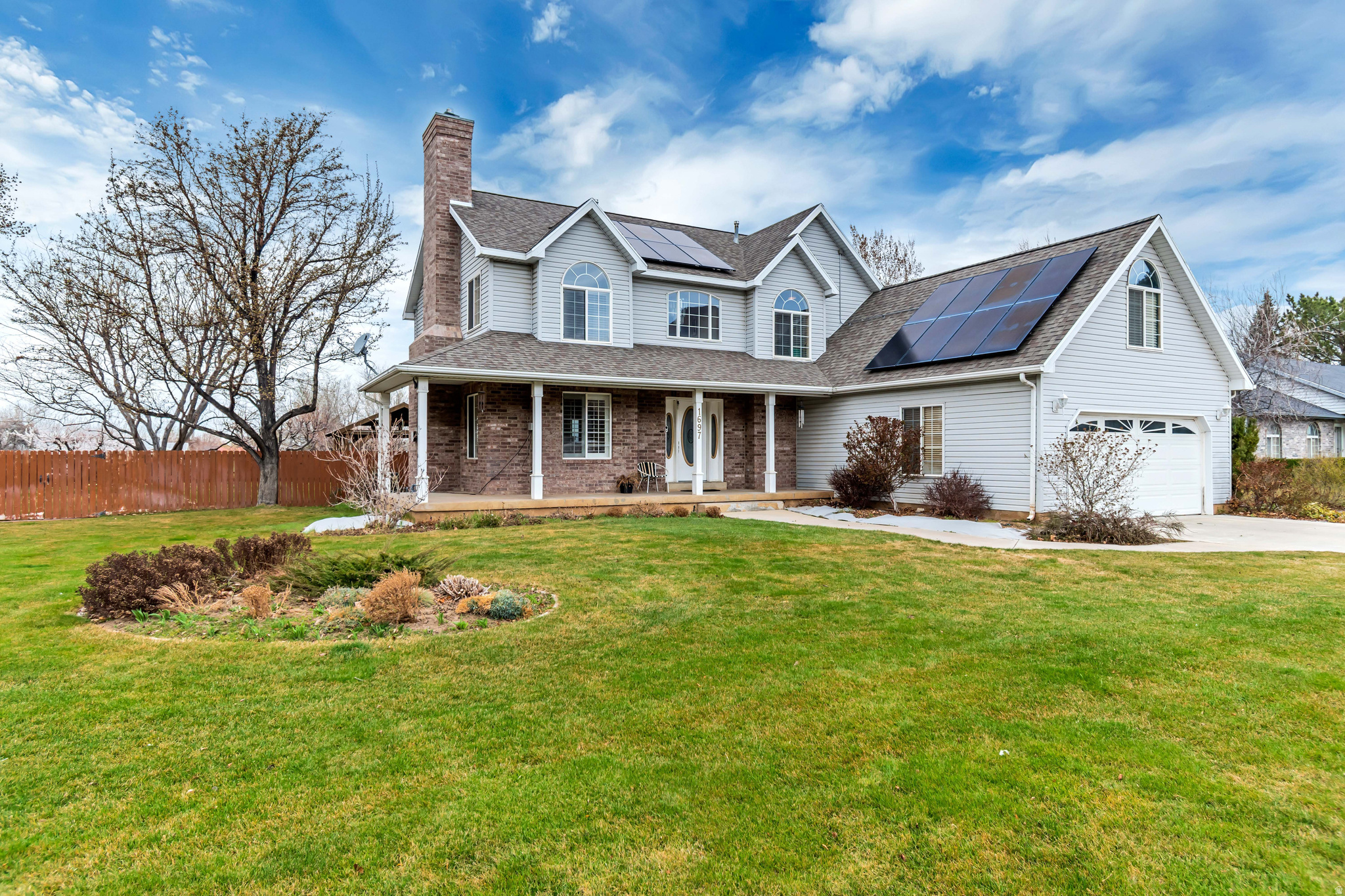 *Better than new, this pristine two-story home is located in a highly sought-after Mapleton neighborhood and truly has it all. Extensively updated and upgraded over the past few years, the home features a fully renovated kitchen with custom cabinetry, granite countertops, stainless steel appliances, recessed lighting, and high quality CORETEC stone flooring. All bathrooms have been tastefully remodeled, and the entire plumbing system-not just fixtures-was replaced in 2026. Additional upgrades include two new water heaters, dual furnaces for enhanced efficiency, two A/C units, and a roof replaced within the last five years. The property also includes solar panels with a backup battery (fully paid off at closing), keeping the average monthly electric bill around $15.  Storage is abundant throughout, with walk-in closets, a spacious garage, and a basement that includes a large cold storage room. The basement also features a full kitchen, offering excellent potential for a mother-in-law apartment. Interior highlights include three-tone paint, crown molding, high-end carpeting, a gas fireplace, and plantation shutters.  Situated on a beautifully landscaped half-acre lot, the home boasts stunning mountain and valley views. The yard is fully fenced and equipped with automatic sprinklers, along with mature fruit trees including multiple varieties of apples, pears, cherries, plum, nectarine, apricot, Asian pear, peach, and pluot, as well as grapes, blackberries, and strawberries. Outdoor features also include a large custom storage shed, multiple concrete patios, and ample parking space for vehicles and recreational toys.  Meticulously maintained and completely move-in ready, this exceptional property is a must-see-schedule your private tour before it's gone!