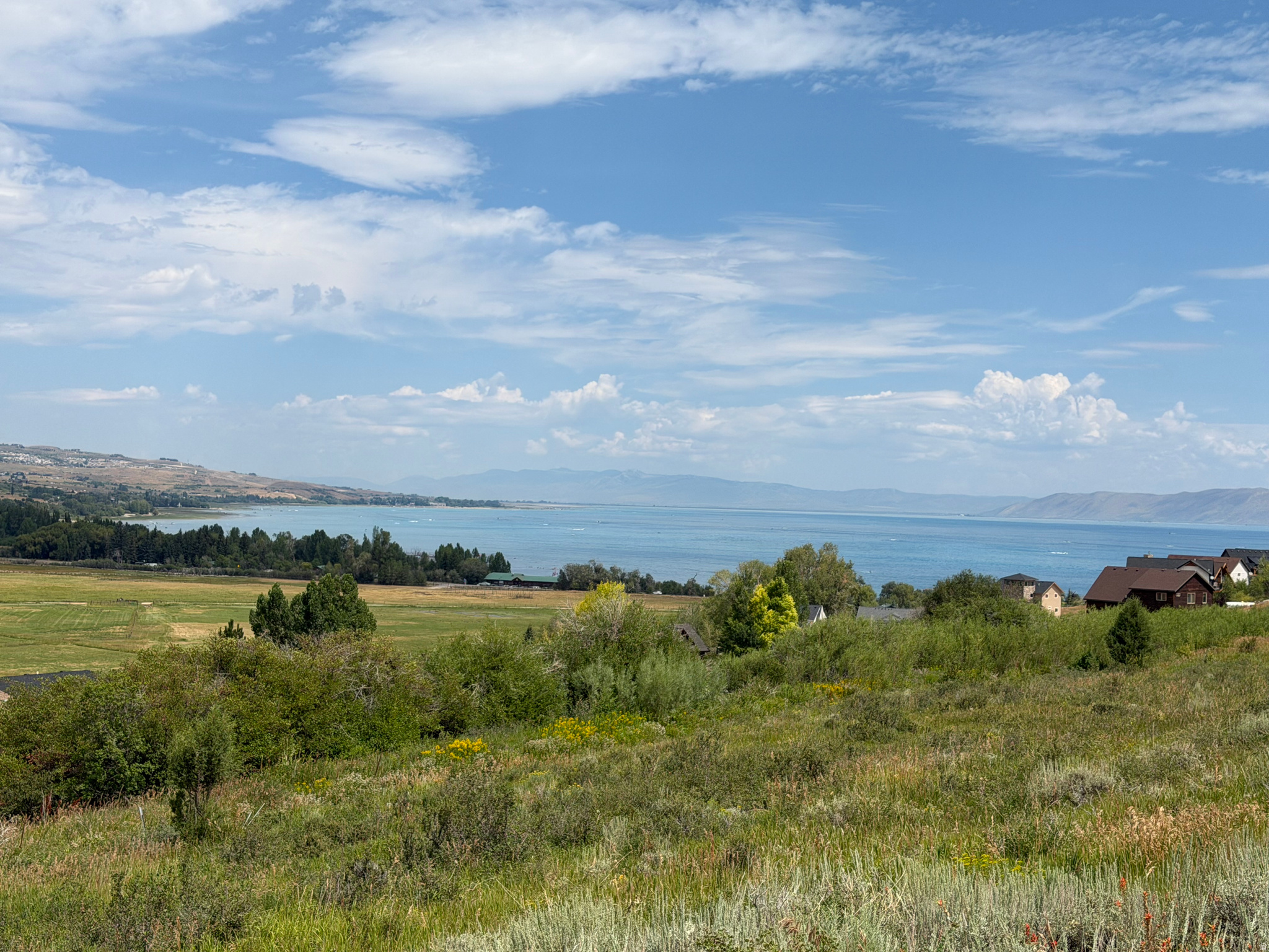 Discover the perfect setting for your dream home here in the desirable Swan Creek HOA. Located in a gated community, this exceptional lot offers amazing views of the lake and the surrounding landscape, with a creek nearby adding to the peaceful mountain setting. Enjoy year-round access, including winter access, making this a great option for a full time residence or mansion retreat. The gentle slop provides an ideal opportunity for a walkout basement, allowing you to maximize the view and create the home you've been envisioning.