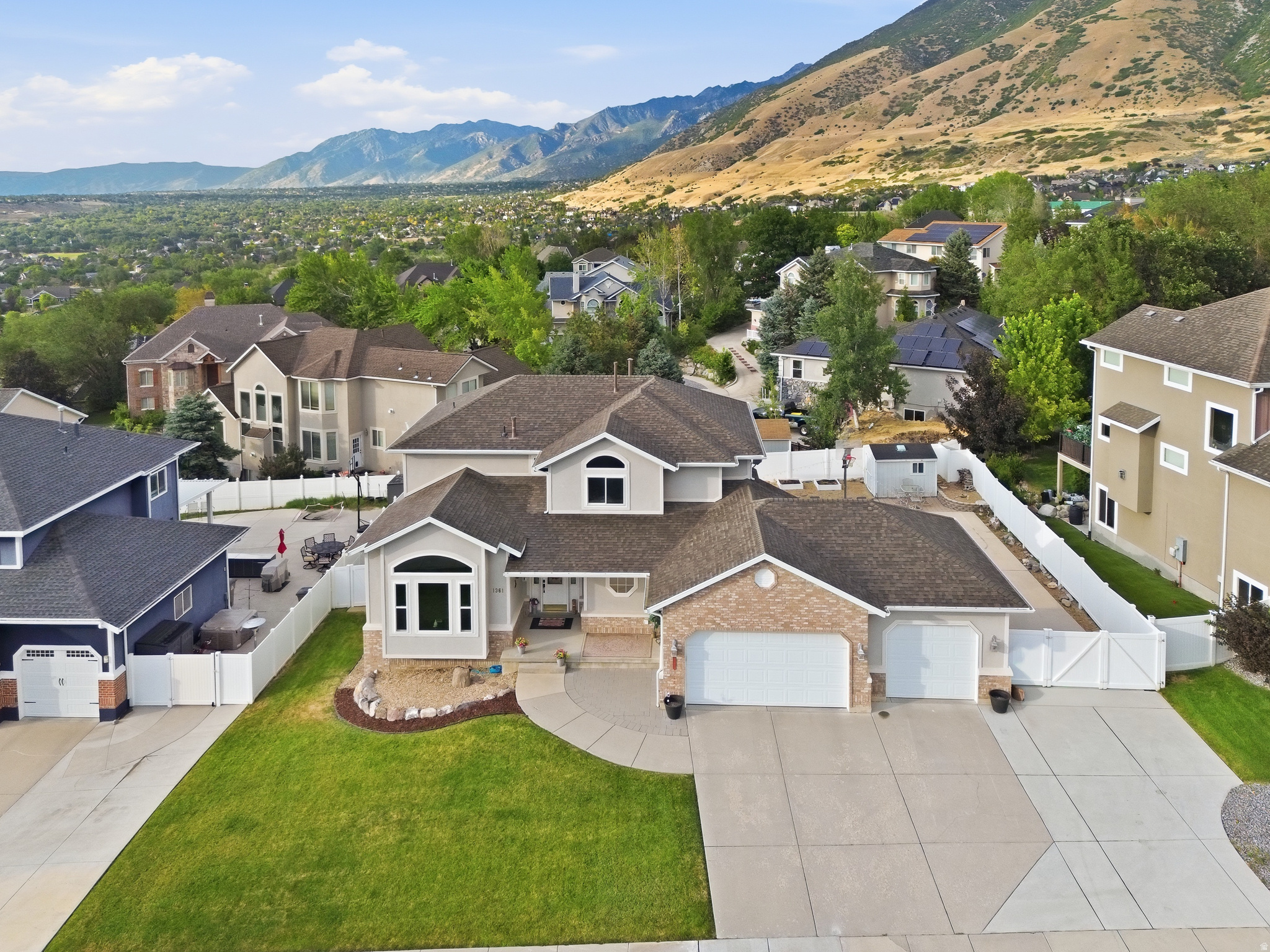 Nestled on a quiet cul-de-sac in one of Draper's most desirable neighborhoods, this beautifully updated 5-bedroom, 4-bathroom home offers the perfect blend of luxury, comfort, and convenience. Surrounded by breathtaking mountain views, this exceptional property is designed for both everyday living and memorable entertaining.  Step inside to discover new carpet, spacious living areas filled with natural light, and a thoughtfully designed floor plan that flows effortlessly throughout the home. The stunning primary suite serves as a private retreat, featuring a spa-inspired bathroom with luxurious finishes that create the perfect place to relax and recharge. Significant recent upgrades-including a new roof, new furnaces and air conditioning units, and two new water heaters-offer modern efficiency and lasting peace of mind for years to come.  Outside, enjoy the convenience of a spacious 3-car garage, dedicated RV parking, and a beautifully situated lot that captures spectacular Wasatch Mountain views. The walk-out basement provides incredible entertaining, recreation, or multi-generational living. Whether you're enjoying a quiet evening on the patio or hosting family and friends, this home offers the ideal setting to enjoy Utah's beautiful seasons.  Perfectly located just minutes from South Mountain Golf Course, the world-class Corner Canyon trail system, Draper Equestrian Park, Draper Park, and Draper Cycle Park, this home places hiking, mountain biking, golf, and endless outdoor recreation right outside your door. With top-rated schools, shopping, dining, and easy freeway access nearby, you'll enjoy the very best of Draper living.  This meticulously maintained, move-in-ready home is a rare opportunity to own an exceptional property in one of Draper's premier communities.