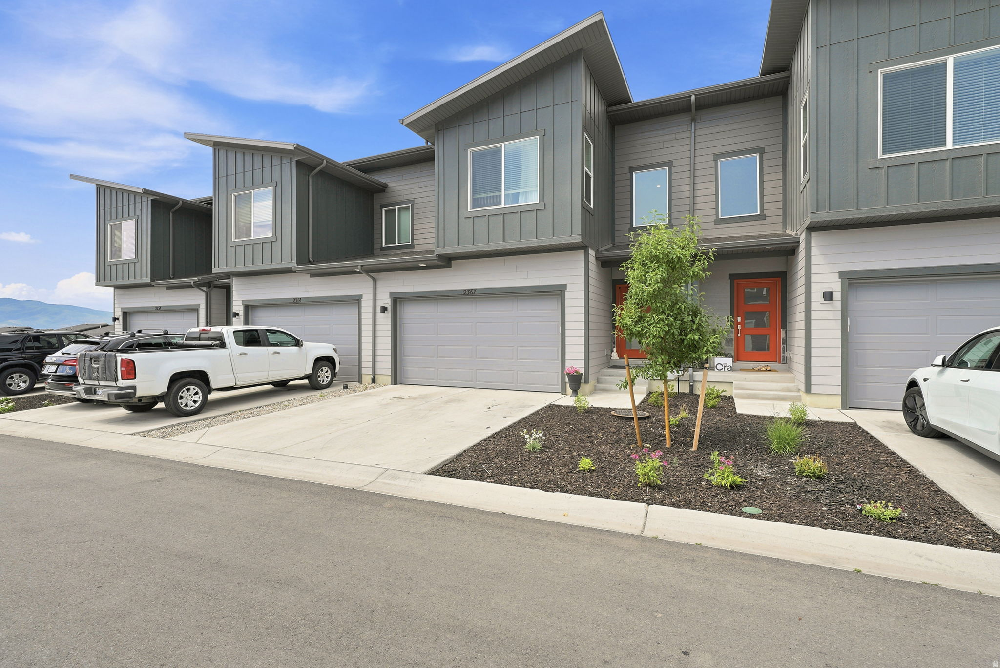 VIEWS! The views from this new townhome in Coyote Ridge are unbeatable and a must see.  This spacious townhome offers 3 bedrooms, 2.5 bathrooms, and an attached 2-car garage and an unfinished WALKOUT basement to add a bedroom and living room. On the main floor, an open-concept kitchen offers white craftsman-style cabinets, white quartz countertops with gray veining, and stainless steel appliances.  Upstairs is the owner's suite with a spacious bathroom, laundry room, two additional bedrooms, and a full secondary bathroom. This community has fantastic walking paths, and a great community feel.   Square footage figures are provided as a courtesy estimate only and were obtained from Building records. Buyer is advised to obtain an independent measurement.