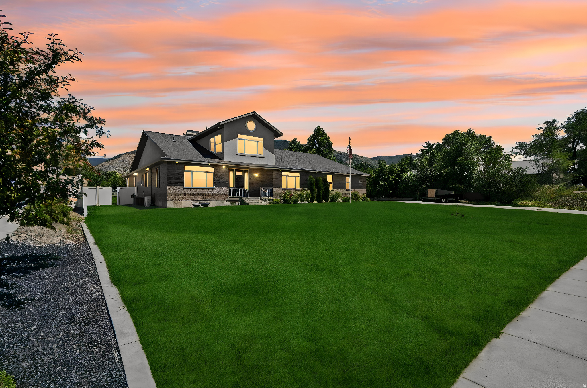 iscover a truly exceptional estate offering over 5,300 square feet of thoughtfully designed living space on a fully usable 1-acre lot in one of the area's premier neighborhoods. Built for luxury, flexibility, and long-term self-sufficiency, this one-of-a-kind property combines high-end finishes with remarkable functionality. The main residence features 6 bedrooms and 4 bathrooms, spacious gathering areas, soaring vaulted ceilings, a gourmet kitchen with a large double island, and abundant natural light throughout. Multiple private exterior entrances-including a separate basement entrance and an additional bedroom with its own exterior access-offer incredible flexibility for multi-generational living, guests, home business opportunities, or rental potential. Adding even more value is a detached 1,000-square-foot accessory dwelling unit (ADU) complete with its own kitchen, bathroom, bedroom, and private entrance. The property also includes an impressive heated shop/outbuilding with oversized doors, extra-height ceilings, workshop space, overhead crane capability, extensive storage, RV parking, and room for hobbies, mechanics, contractors, or business operations.  Designed with sustainability and resilience in mind, the home is equipped with solar power, propane utilities, a private well, culinary water, irrigation water with a water share, mature landscaping, fruit trees, vegetable gardens, and fenced outdoor spaces. The exceptionally low utility costs and independent infrastructure make this an ideal property for buyers seeking greater energy efficiency, preparedness, and long-term self-reliance. Whether you're looking for a luxury family estate, an income-producing property, a homestead, or a private retreat built for modern independence and emergency preparedness, opportunities like this are exceptionally rare. Property Highlights: 5,316 sq. ft. 6 bedrooms | 4 bathrooms 1-acre fully landscaped lot Detached 1,000 sq. ft. ADU with full apartment including a kitchen and laundry room Heated shop with oversized garage, workshop, and RV parking, hookup and storage Double-island gourmet kitchen Separate basement entrance Bedroom with private exterior access Solar power + propane = exceptionally low utility costs Private well, culinary water, irrigation water, and water share Fruit trees, mature landscaping, vegetable garden Parking for up to 12 vehicles Designed for energy efficiency, self-sufficiency, and long-term resilience This is more than a dwelling-it's a private estate built to thrive in today's world while being exceptionally prepared for tomorrow.