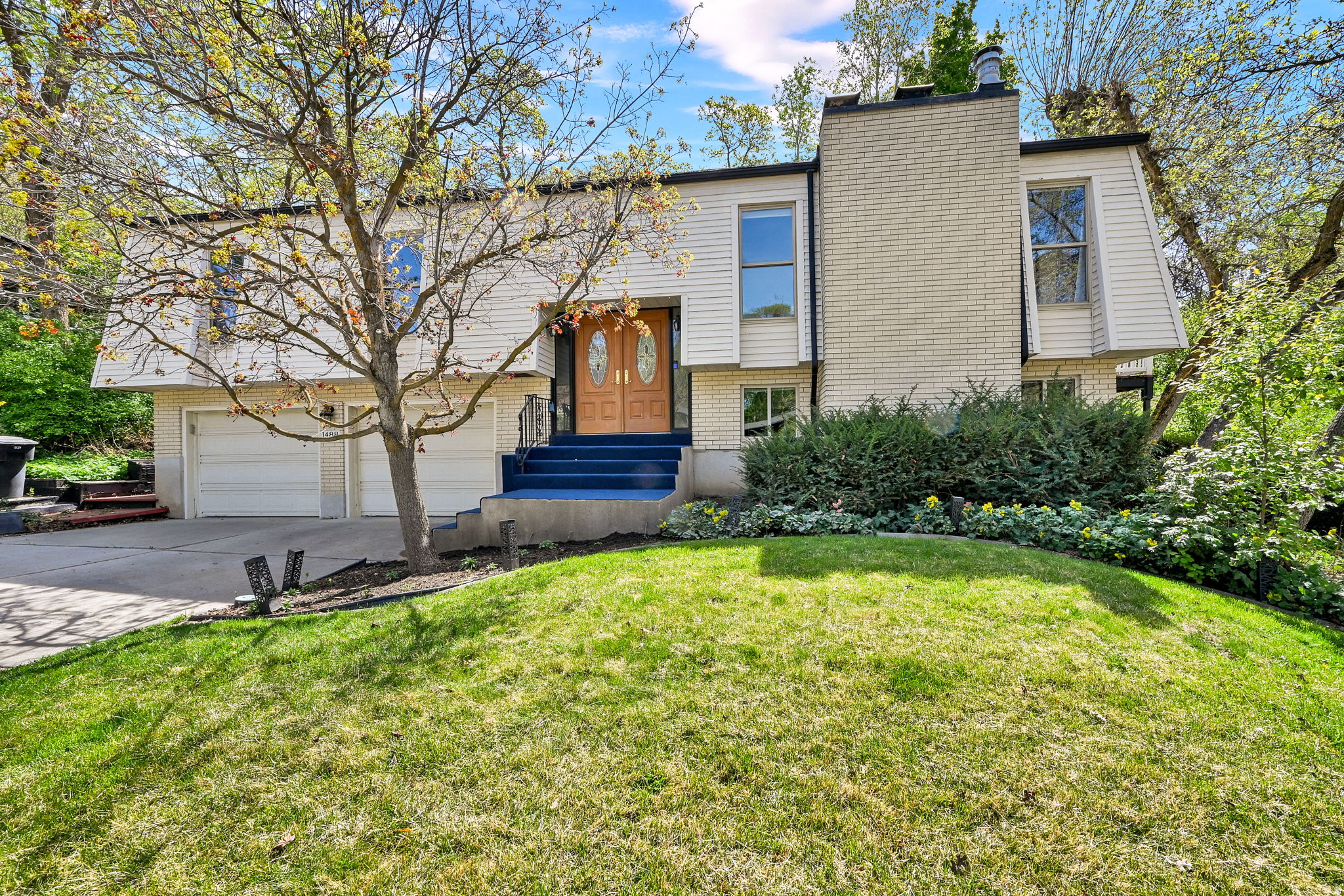 OPEN HOUSE SATURDAY MAY 30 - 10AM-1PM.  Imagine owning your own private retreat in the foothills of Fruit Heights! Tucked among quiet tree-lined streets, this home immediately invites you to slow down, exhale, and relax. Sunlight pours through oversized windows, the wooded backdrop creates a sense of calm and privacy, and every space feels warm, inviting, and full of character. Beautiful mid-century modern details and original architectural touches give the home an authenticity that is increasingly rare. At the center is an entertainer's kitchen, designed for connection, flowing effortlessly into intimate living spaces and a fabulous private backyard that's perfect for everything from quiet evenings on the deck to elegant dinner parties and larger soires under the trees. Homes with this much charm, serenity, and lifestyle appeal rarely come available in Fruit Heights . . . especially at this price point. This is a rare opportunity to enjoy one of Davis County's most sought-after neighborhoods while creating additional value over time.  Main floor square footage figures are provided as a courtesy estimate only and were obtained from County Records .  Buyer is advised to obtain an independent measurement.