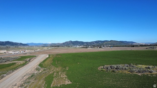 Prime 5-acre corner lot in Soda Springs at the entrance to Barley Meadows with outstanding, unobstructed views. Flat and usable, this parcel offers an excellent building site with flexibility for a beautiful home, shop, or additional improvements. If you are seeking acreage with a balance of privacy and convenience-close to town while still enjoying space and a rural setting, then you will LOVE this property. Paved road access and power at the lot support straightforward development. The oversized corner location provides easy access and a strong overall setting within the subdivision. A well-positioned property offering views, usability, and convenience. Call listing agent today for more information.