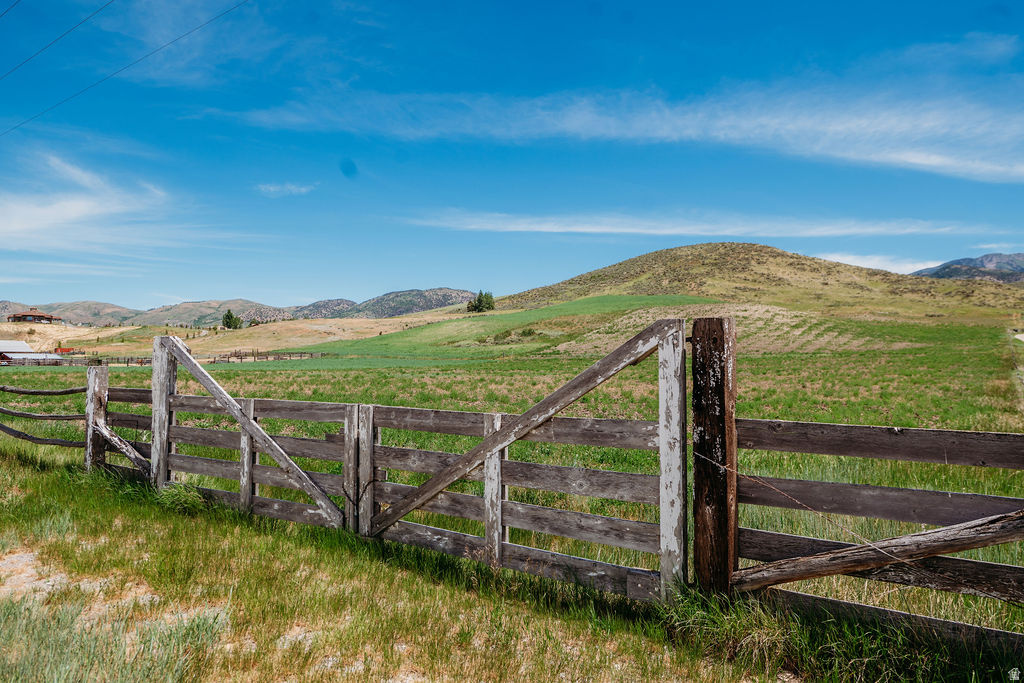 This prime 10-acre agricultural/residential lot is ready for your personal touches! Build your dream house, bring your animals, and enjoy the amazing views of this beautiful valley. You'll be minutes from Malad, I-15, Devils Creek, and the Caribou National Forest, giving you the best of country living with access to everything you need and want. Located on a recently re-paved road, you have year-round access and winter snow removal without an HOA. Don't miss your chance at this incredible property! The lot is an original parcel and can be divided. See attached documents.