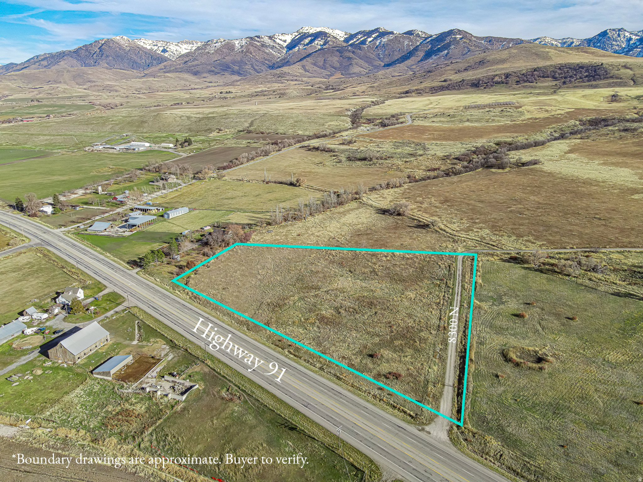 Discover an amazing opportunity with this 7.15-acre parcel in Richmond! Boasting an impressive ~740 feet of highway frontage on Highway 91, this property offers prime visibility and easy access! A private gravel road (8300 N) provides direct entry from the highway, making it convenient for the new owner. The existing road is in excellent condition and runs along the entire south border of the parcel. Enjoy stunning views of Cache Valley without any steep slopes! Whether you envision building a home, starting a farm, or exploring agricultural possibilities, this property is full of potential. The included water right (approved well permit) provides 1.73 ACFT of water, and the buyer will be responsible to drill their own well. The closest power source is conveniently located just across Highway 91. Since the property is not within city limits, sewer services would be provided by septic. Please note that the seller is relinquishing this property as part of a 1031 exchange, so seller financing will not be available. Parcel is currently in greenbelt. Don't miss out on this incredible opportunity to make this property your own and bring your vision to life! We kindly ask that all showings be scheduled by permission only. Private property signs are posted for your safety and the protection of the property, so please reach out to the listing agent to obtain permission before visiting the property. If you are represented by a buyer's agent, please coordinate all showings through them. For unrepresented buyers, we ask that you coordinate directly with the listing agent. We have provided all the information as a courtesy to you, the buyer. However, it is your responsibility, along with your buyer's agent if you have one, to verify any and all information to your satisfaction. Thank you for your understanding, and we look forward to assisting you. If you have any questions or need further assistance, please don't hesitate to reach out..
