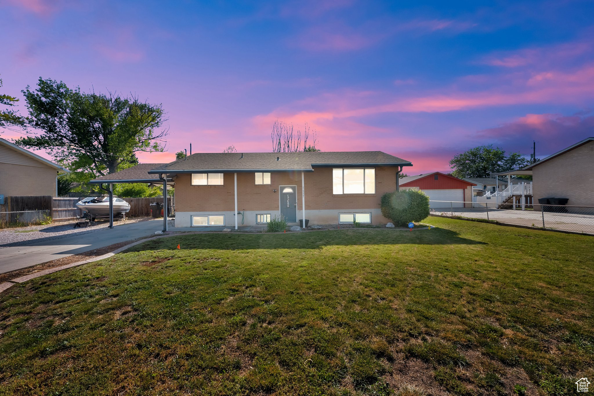 This well-maintained 5-bedroom, 2-bathroom home in Clinton, Utah offers an ideal layout for comfortable living. The open floor plan features a large living area filled with natural light, and a spacious kitchen perfect for meal prep and entertaining. With five generous bedrooms and two full bathrooms, this home provides plenty of space for everyone.  Step outside to a large deck area-perfect for outdoor gatherings-along with a fenced yard and plenty of room for relaxation. The property also includes a carport, RV parking, and a shed for added storage. Situated on a 1/4 acre lot, this home offers ample parking and easy access to nearby amenities, schools, and commuter routes.