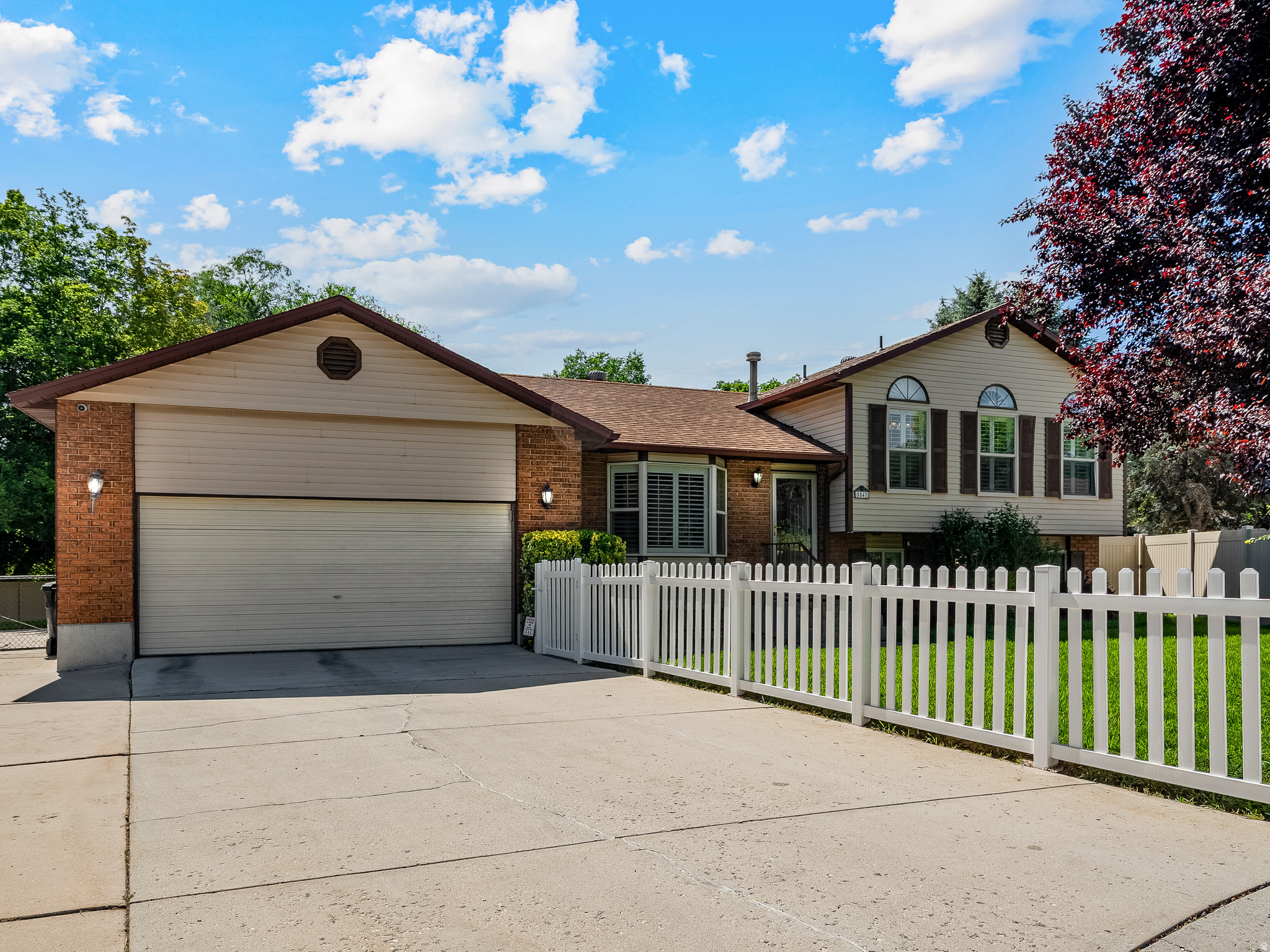 This is a Taylorsville Gem! Don't miss out on this meticulously, well-taken care of 4 bedroom, 3 bathroom home! Located in a cul-de-sac, on .29 acres, with RV Parking plus a Hot Tub! The Master Bedroom has a private deck, private bathroom, walk in closet, additional/separate heating & cooling system, plus extra space with a mounted TV & surround sound. The main floor is very spacious with an entry living room, huge family room, semi-formal dining of the kitchen, mud/laundry room, and a huge pantry. The park-like backyard is fully fenced, fully mature, fully landscaped, full sprinklers, and includes 2 sheds. The garage is large enough to fit a full sized truck, plus there is additional fenced RV Parking. Appliances included! Hot Tub Included! The Furnace and A/C were replaced recently. Plantation shutters throughout. Newer windows!