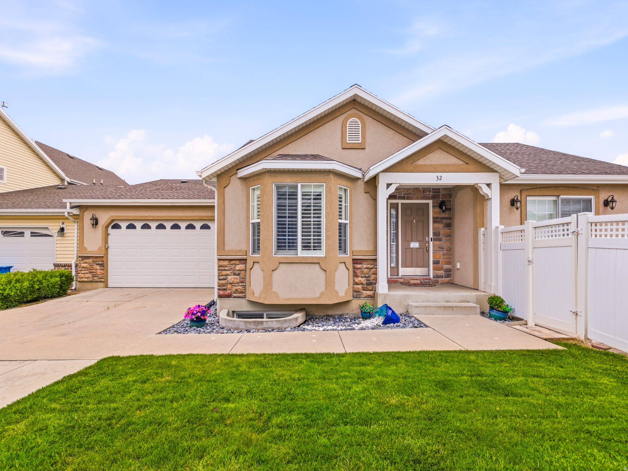 Welcome to this beautifully crafted home in American Fork, where comfort, quality, and entertainment come together seamlessly. This 2-bedroom home offers the flexibility to easily add a third bedroom, making it perfect for growing needs. The stunning kitchen features granite countertops, knotty alder wood cabinets, and stainless steel appliances, all complemented by exceptional built-in cabinetry found throughout the home.  The spacious master suite is a true retreat, complete with dual sinks, a jetted tub, and a walk-in closet. Thoughtful upgrades include a new water softener, tankless water heater, and a water filtration system, providing modern efficiency and peace of mind. This home is truly turnkey, with the refrigerator, washer, and dryer all included.  Designed for entertaining, the basement boasts a full wet bar alongside a theater room equipped with surround sound and a large projector that stays with the home. Two gas fireplaces add warmth and charm, while plantation shutters enhance the elegant feel throughout. The fully fenced private patio offers a quiet outdoor escape, and the garage features extensive built-in cabinetry for exceptional storage. This home is a rare find, showcasing incredible craftsmanship and ready for you to enjoy from day one.