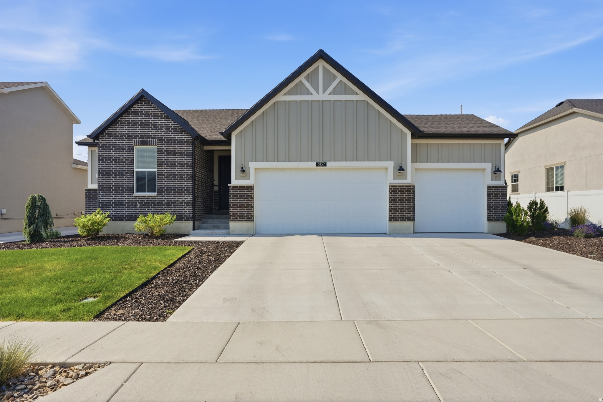 Beautifully maintained 2022 rambler with no HOA, a 3-car garage, and room to grow. This one-owner home has been exceptionally cared for with no pets and a no-shoes household, showing true pride of ownership throughout. The main level features 3 bedrooms, 2 full bathrooms, main-level laundry, 8-foot doors, vaulted ceilings, and an open kitchen/living area with quartz countertops, white cabinetry, stainless appliances, an island, and refrigerator included. The primary suite offers a walk-in closet and separate tub/shower. The unfinished basement is rough-plumbed for a future bathroom and offers excellent potential for additional bedrooms, bathrooms, storage, or a second living area. A radon mitigation system is already installed for added peace of mind. Outside, enjoy a fully landscaped and fully fenced yard with full sprinklers, a small patio, and no direct rear neighbors. The wider side yard preserves flexibility for future RV parking or a pad. Conveniently located with easy access to Bacchus Highway, Highway 201, the airport, shopping, dining, schools, parks, recreation, and everyday amenities. Clean, move-in ready, and full of future potential.