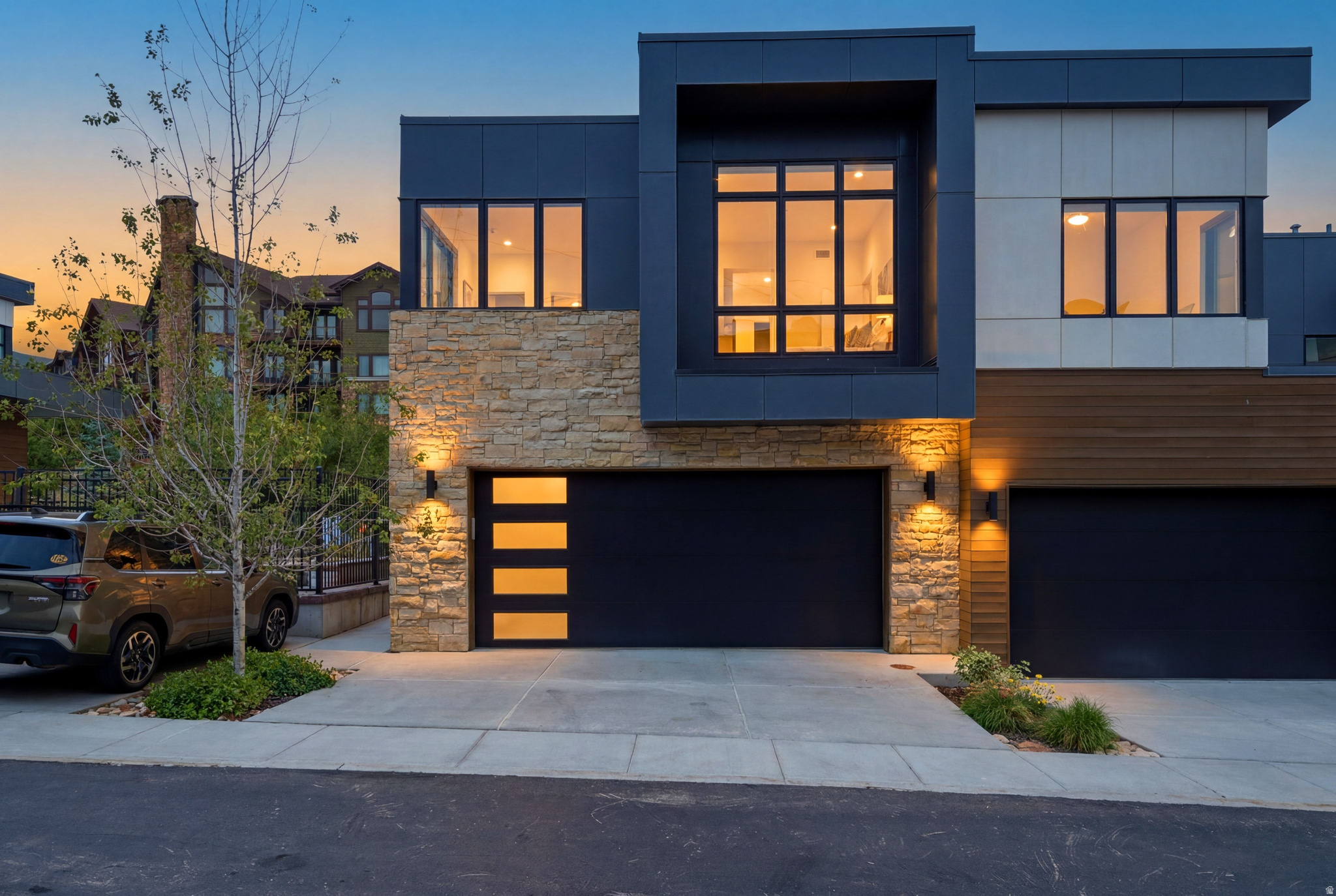Rarely available and impeccably maintained, this nearly new Viridian townhome offers a coveted blend of privacy, luxury, and effortless mountain living in one of Park City's most desirable resort locations. Set within an exclusive enclave of only 22 residences, owners enjoy access to a private pool and spa while being just steps from the Frostwood Gondola, the Canyons Golf course, and the Waldorf Astoria. Built in 2021 and never offered as a rental, the residence showcases refined modern design, ski resort views, and exceptional attention to detail. The spacious primary suite features a private balcony, fireplace, beverage refrigerator, and spa-inspired bath with soaking tub and dual vanities. Thoughtfully designed for four-season adventure, the oversized garage includes custom storage, ski and bike racks, boot dryers, and a dedicated mudroom. Spend your days skiing Park City Mountain and Canyons terrain, enjoying dining and spa experiences nearby, then return home to the tranquility of Viridian. Deer Valley and historic Main Street Park City is approximately 10 minutes away, offering world-class skiing, dining, shopping, galleries, and year-round events. Designer furnishings by Barclay Butera are negotiable, creating a turnkey opportunity for those seeking an elevated resort lifestyle.