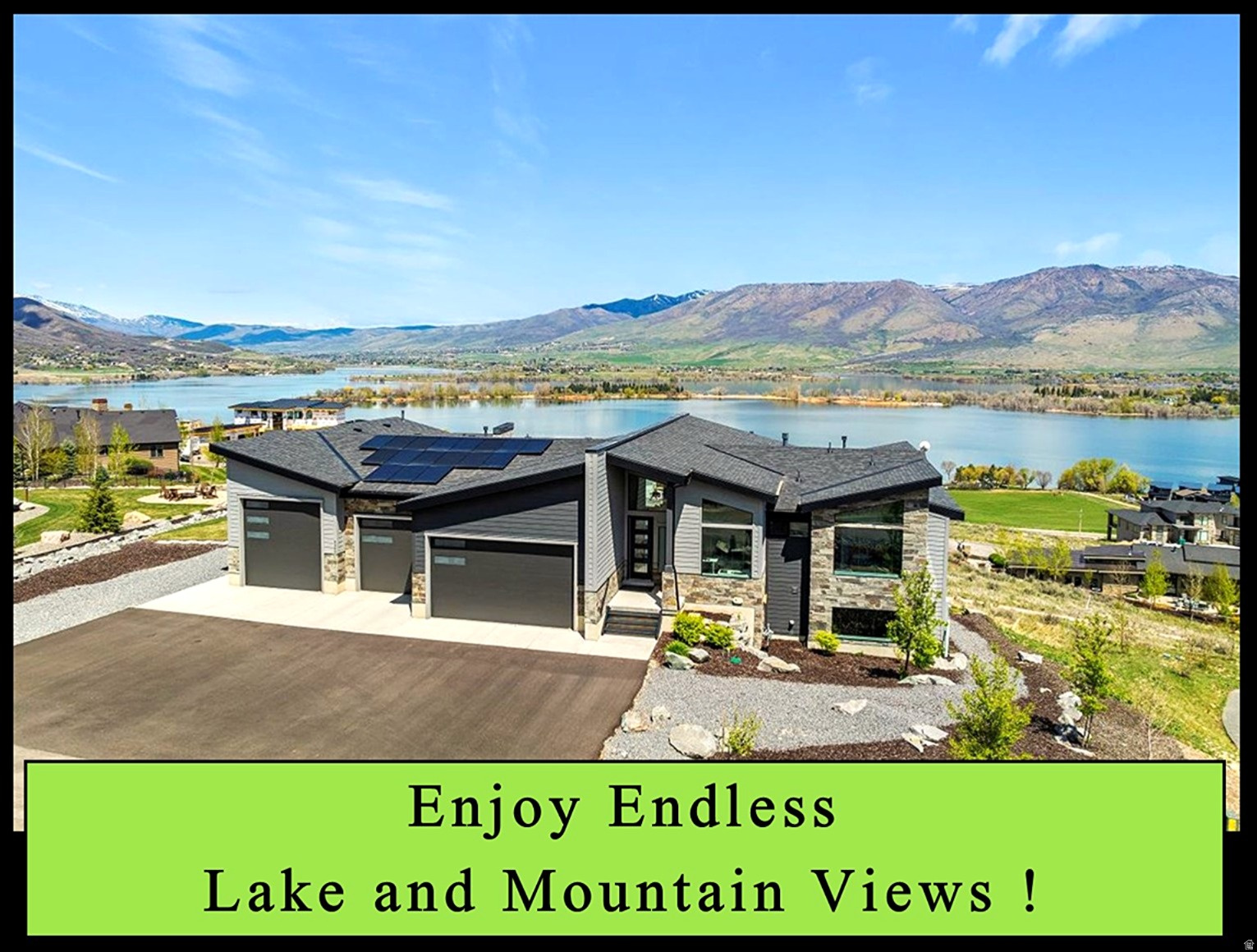 Designed with Distinction in this custom built modern-style home with handsome exterior of stone and hardi-board siding in a deep rich color palette and dramatic roof angles. Luxury interior featuring tucked away dedicated office or formal living room for privacy, elevated vaulted ceilings in the great room with expansive windows showcasing endless views of the lake and mountains, stone fireplace and steel railings compliment the warmth of the hardwood floors, gourmet kitchen with premium appliances / dual ovens / desirable gas range / large center island / lots of cabinets for ample storage plus large walk-in pantry, roomy dining area, seamless indoor-outdoor flow to the expansive covered deck for year-round entertaining. Primary bedroom with ensuite having generous tiled shower with multiple shower heads / dual sinks, walk-in closet with washer and dryer hookups. Additional bedroom with ensuite on main level, and mud room with half bath. The finished lower level is ideal for entertaining in the extensive family room complete with wet-bar and sliding doors to large covered patio and fire pit area, two additional comfortable bedrooms and 1 full bath. Thoughtfully designed bonus space just steps away featuring exercise room, theater room area and plenty of room for family game night. Ample space for vehicles, recreational toys and storage in the multi-car garage. Owner is a licensed real estate agent. Schedule via Aligned Showings.