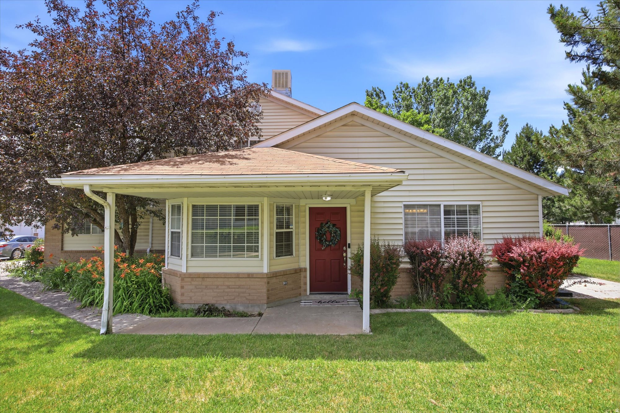 Move-in ready and thoughtfully updated, this end-unit North Logan townhome offers comfort, convenience, and low-maintenance living in a prime Cache Valley location. Vaulted ceilings, abundant natural light, and spacious living areas, this home offers a comfortable and functional layout. The inviting main level features a cozy fireplace, large family room, dining area, and a kitchen with ample cabinet space. The main-level primary suite provides the convenience of single-level living and includes dual vanities, a separate shower, soaking tub, and mirrored closet doors. Upstairs, has two spacious bedrooms and a full bathroom. Recent improvements including brand-new carpet and flooring throughout the entire home and a new water heater. Enjoy the benefits of an end-unit location with mature landscaping, a covered front porch, private patio area, and an attached 2-car garage. Located just minutes from shopping, restaurants, fitness centers, and everyday conveniences, you'll also be only a 5-minute drive from Utah State University and just minutes from downtown Logan. Buyer is advised to verify all information given.