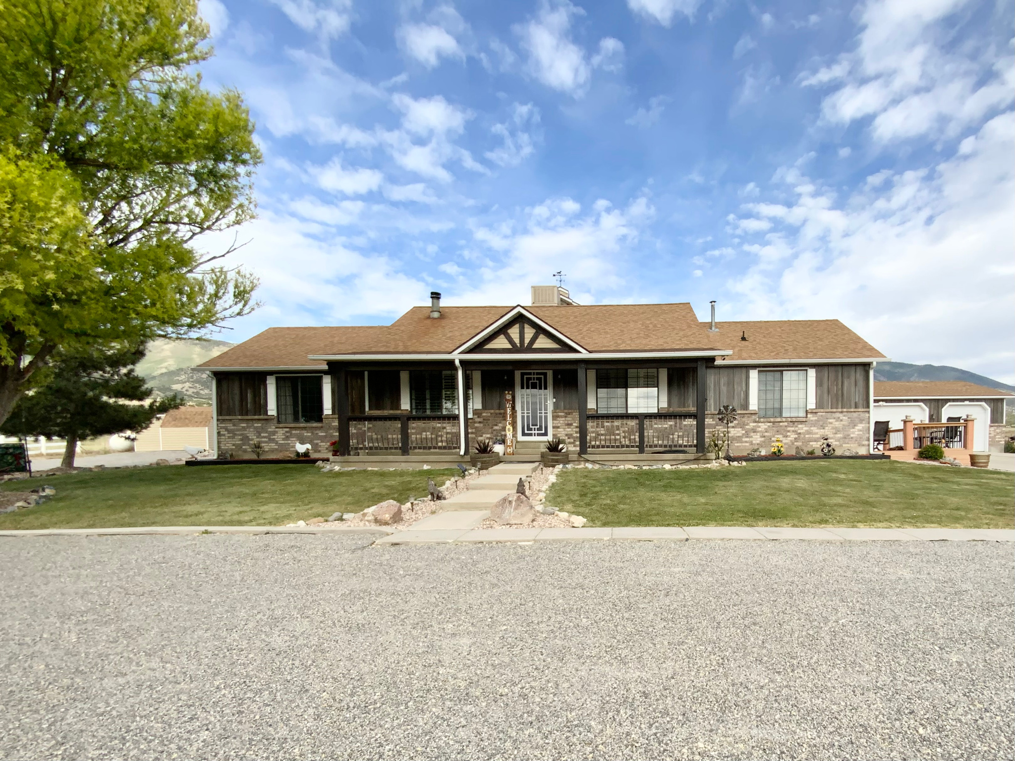 Custom Home w/5 bedrooms, 3 bathrooms. Features vaulted ceilings, beautiful kitchen w/48" range oven, granite countertops, brick backsplash, great room w/ woodstove, main floor primary bedroom, 2nd family room w/ pellet stove, greenhouse, sun-room, built-in BBQ area,  3 car garage, barn w/ additional enclosed RV storage, plenty of places to relax and take in the views and the best part, 20 ACRES, yes 20 acres of land with beautiful views everywhere. (more pictures to come)