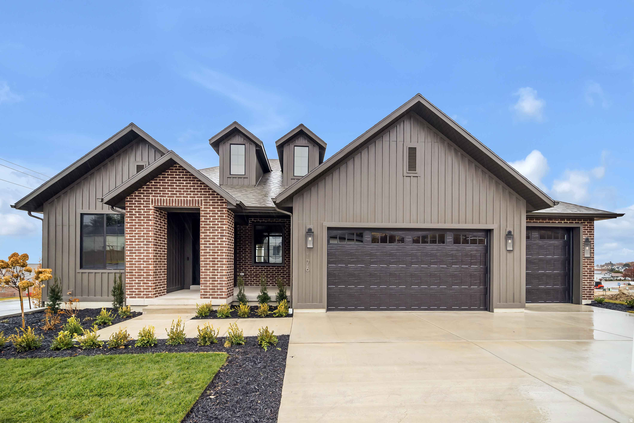 LOT #112 - Discover Symphony Homes popular Concerto plan in the premier Blossom Hill community on the Pleasant Grove east bench. This model home showcases breathtaking mountain and lake views and comes fully landscaped and move-in ready. Thoughtfully selected upgrades and designer finishes highlight every space, from the custom trim work to the beautifully crafted primary suite. Enjoy an inviting, open-concept main level with a stunning kitchen featuring a 36" dual-fuel range, custom vent hood, oversized island, and generous gathering space. The covered deck extends your living outdoors, perfect for taking in the views. The finished daylight basement is built for entertaining-complete with a spacious game room and a stylish wet bar your guests will love. This home has been meticulously designed to impress at every turn. Come experience it in person and see why it stands out in Blossom Hill!