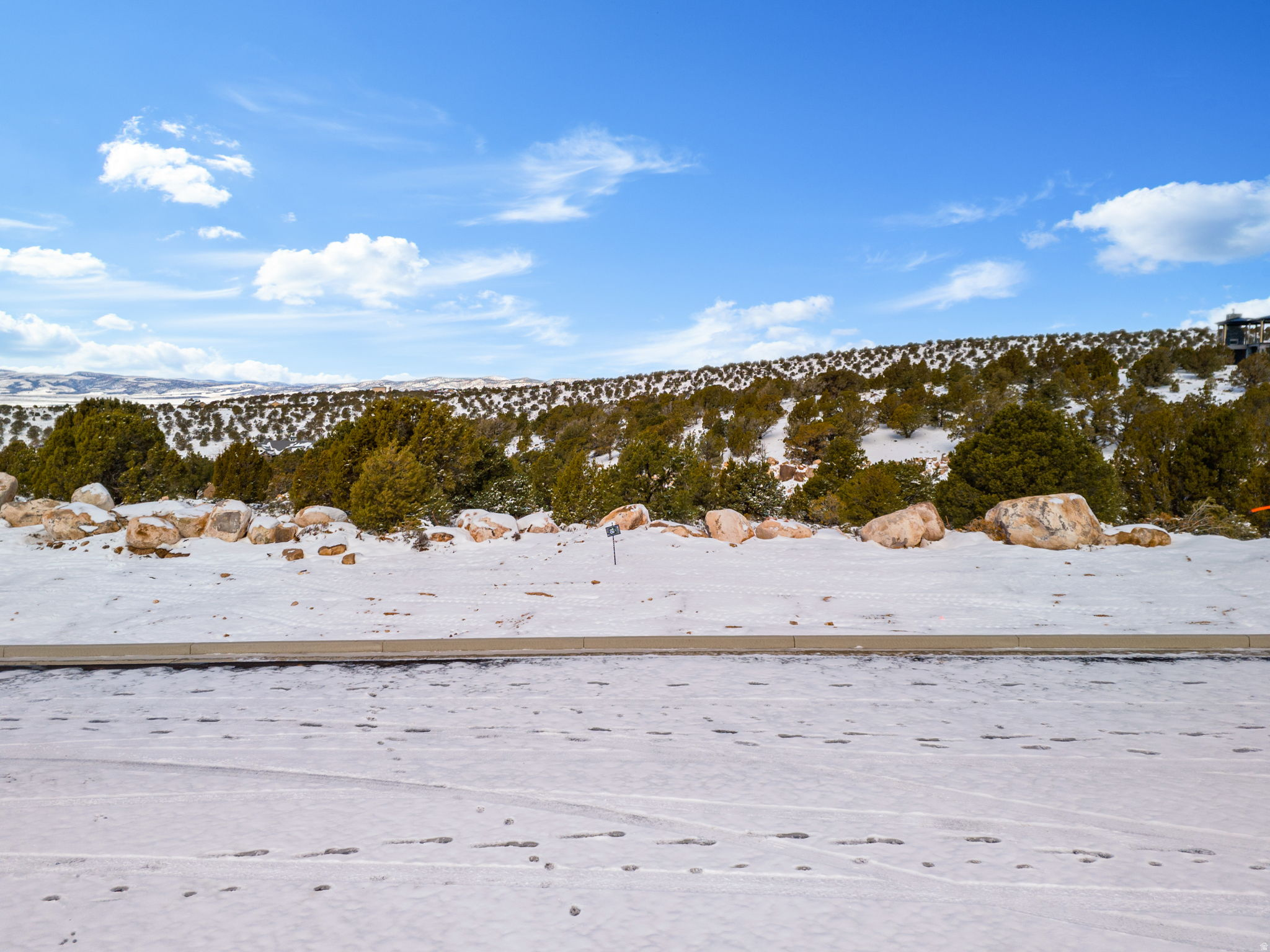 This is Lot Number 18, a 0.61-acre homesite located in the highly sought-after Estates at South Mountain subdivision. Enjoy stunning views of Shurtz Canyon and the surrounding Southern Utah mountains. This growing community is positioned near planned future elementary, middle, and high schools, adding long-term value and convenience. Bring your own builder or choose to build with the South Mountain Development Group. Don't miss this opportunity to secure a premium lot in one of Cedar City's most desirable neighborhoods. No HOA.