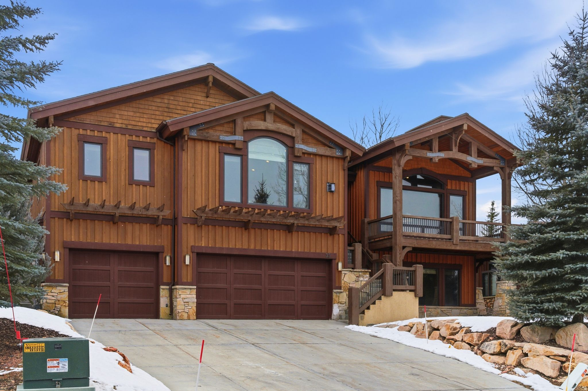 Drawing inspiration from the timeless alpine elegance of Deer Valley Resort, this extraordinary 6,500-square-foot legacy estate captures the very essence of refined mountain living. Perfectly positioned to take in the view, the home is filled with natural light and highlighted by soaring vaulted ceilings that create a grand yet welcoming atmosphere. The spacious main-level primary suite serves as a true retreat, complete with its own fireplace and a spa-inspired bath designed for comfort and relaxation. Five additional en suite bedrooms provide exceptional accommodation for family and guests alike, ensuring privacy and convenience for all. Designed with both intimate gatherings and large-scale entertainment in mind, the home features an open-concept gourmet kitchen and dining area that flows seamlessly into the living room area. Enjoy evenings in the family room with pool and ping-pong or host movie nights in the media/game room. Five fireplaces throughout the residence infuse each space with a warm, cozy mountain ambiance. Additional highlights include a three-car garage, generous storage, mudroom, and a backyard deck ideal for year-round enjoyment. After a day on the slopes, unwind in the private hot tub while taking in the serene alpine surroundings. Serviced by the Deer Valley shuttle, you can enjoy effortless access to the mountain without the hassle of parking. Ownership also offers the exclusive option to join the Solamere Oaks Swim & Tennis Club, including pickleball amenities further enhancing the lifestyle appeal. Whether you are seeking a full-time mountain residence or a luxurious vacation retreat, this exceptional property offers the perfect blend of comfort, convenience, and classic alpine sophistication.